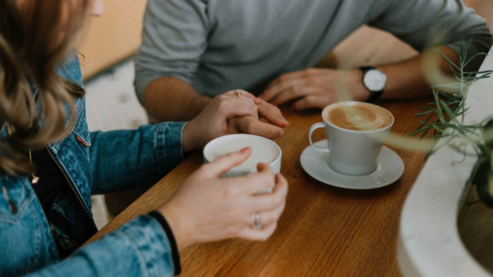 two mugs with coffee on table