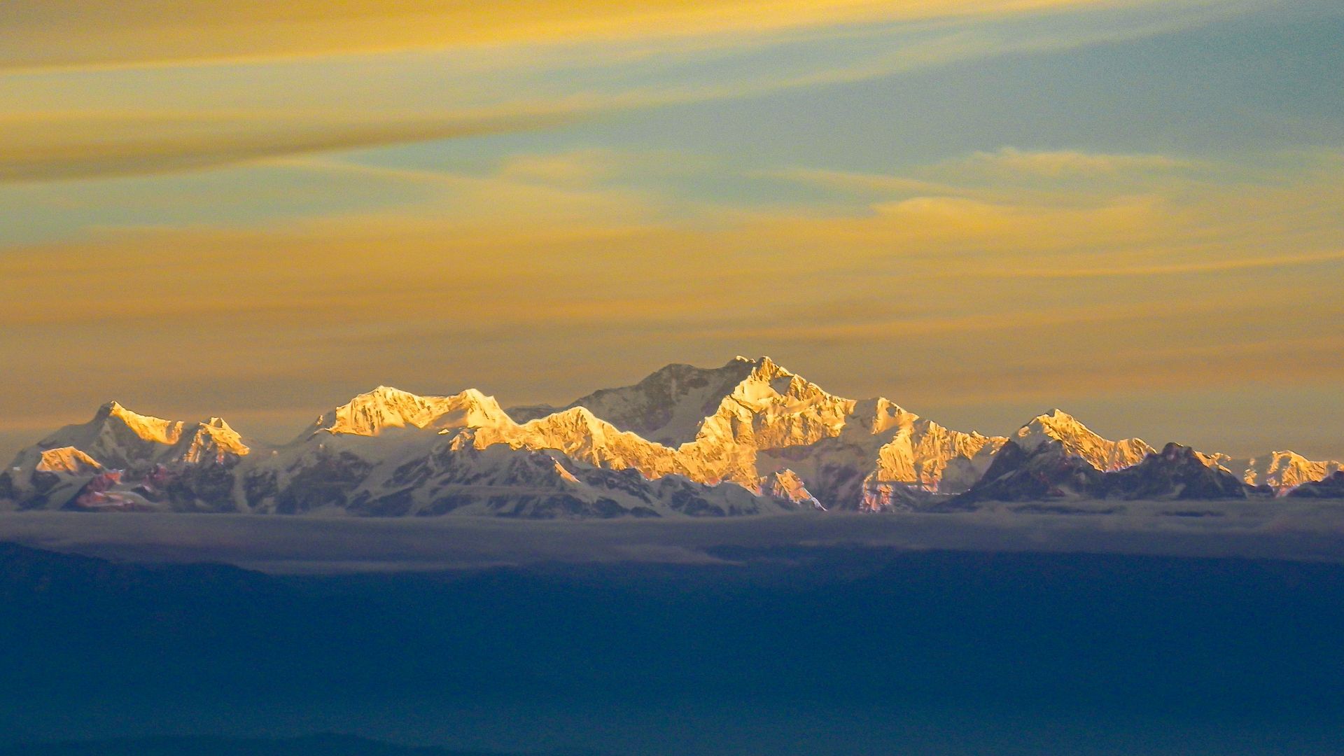 snow covered mountain under blue sky during daytime