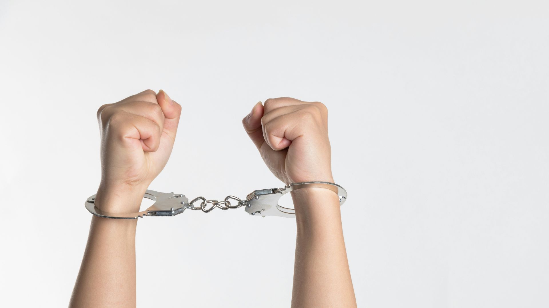 person showing handcuff