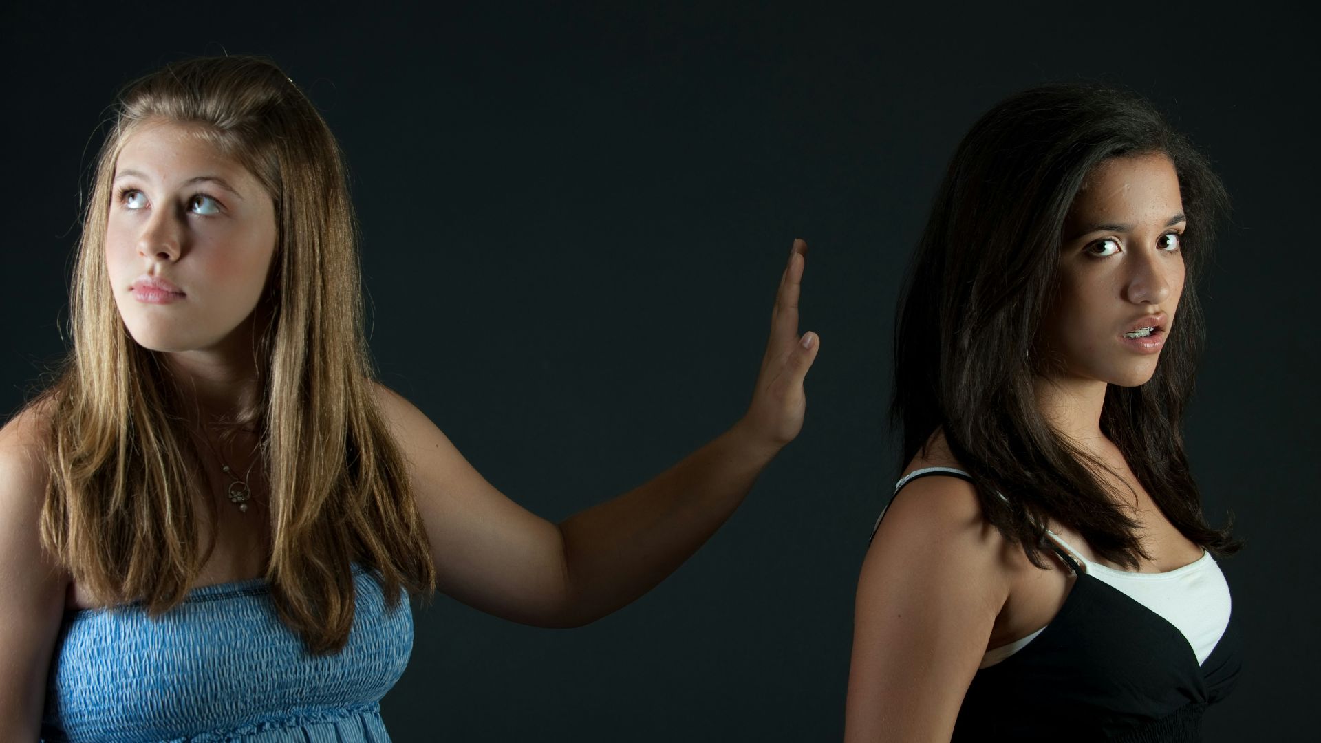 girl in blue sleeveless dress