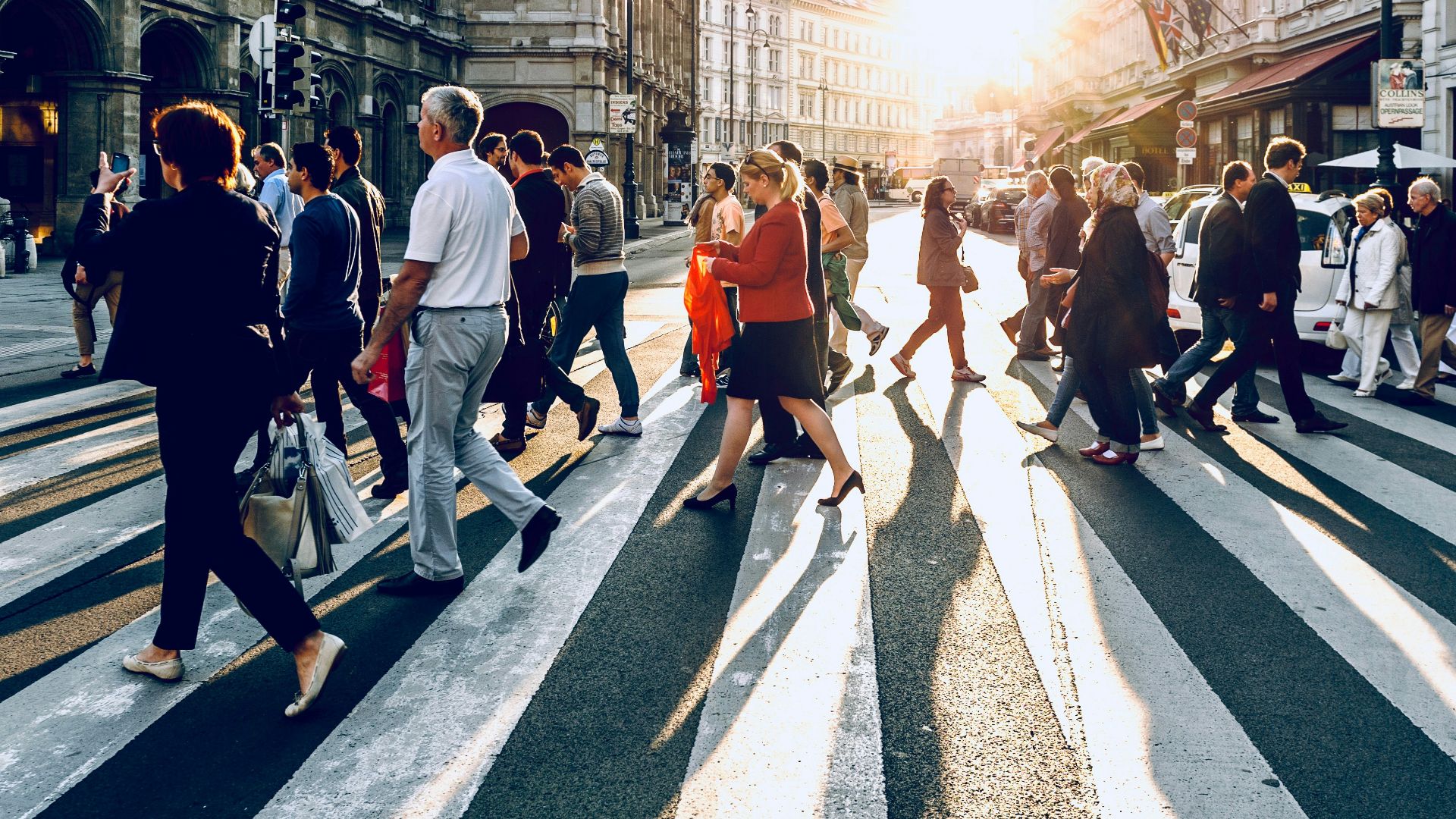 group of people walking on pedestrian lane
