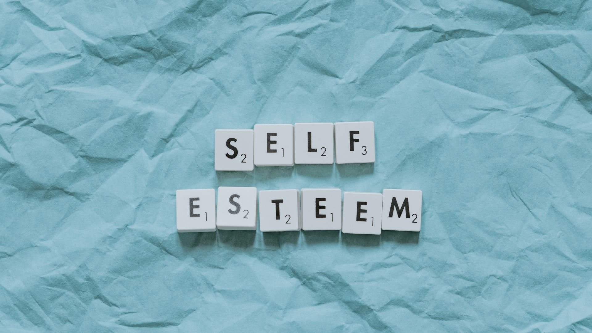 white and black number print on blue textile