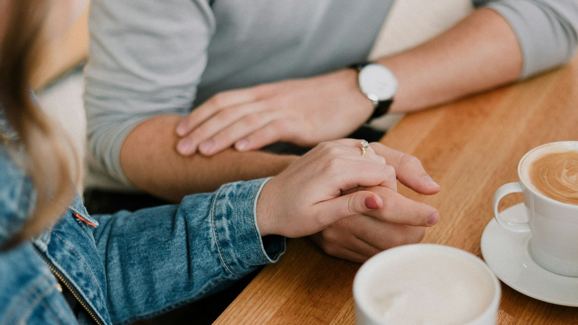 man and woman holding hands