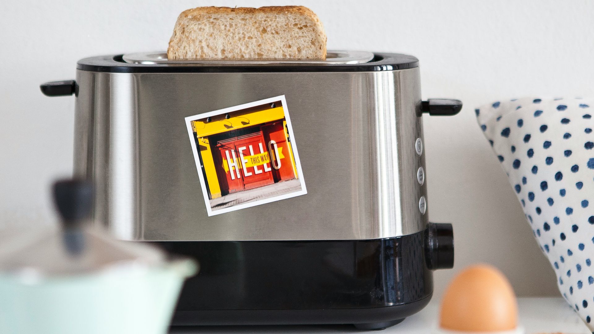 a toaster sitting on top of a white counter