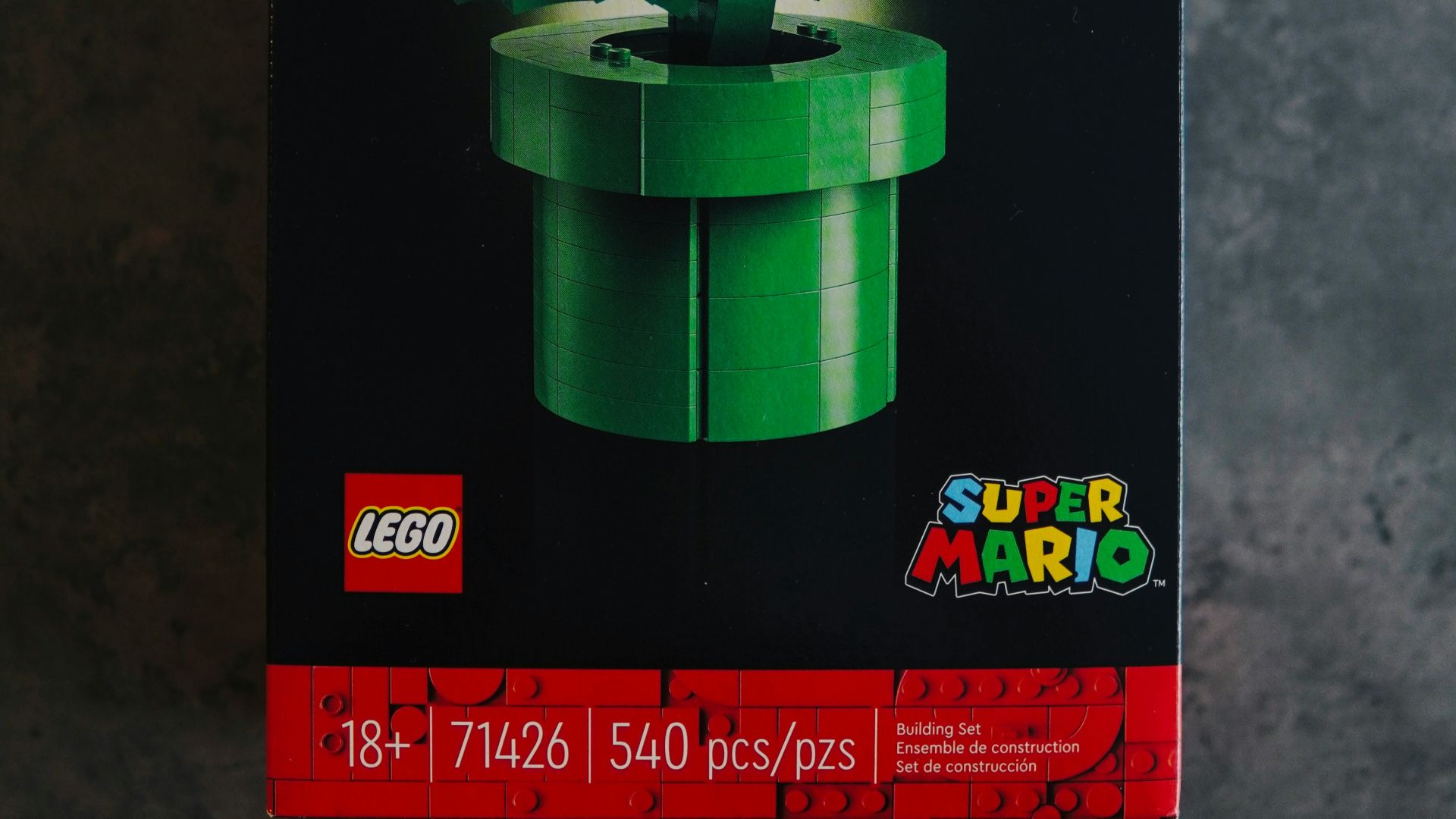 a box of legos with a mushroom on top of it