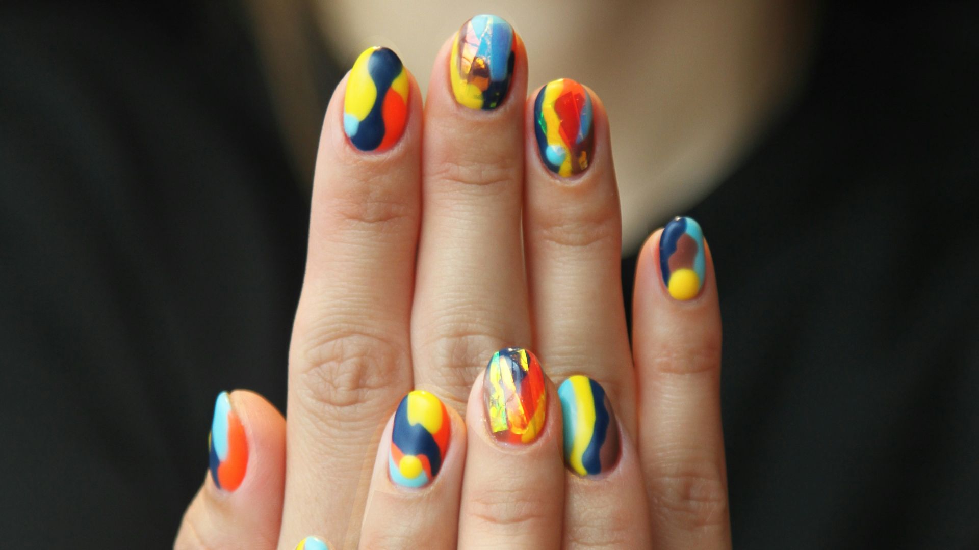 woman's nails with manicure
