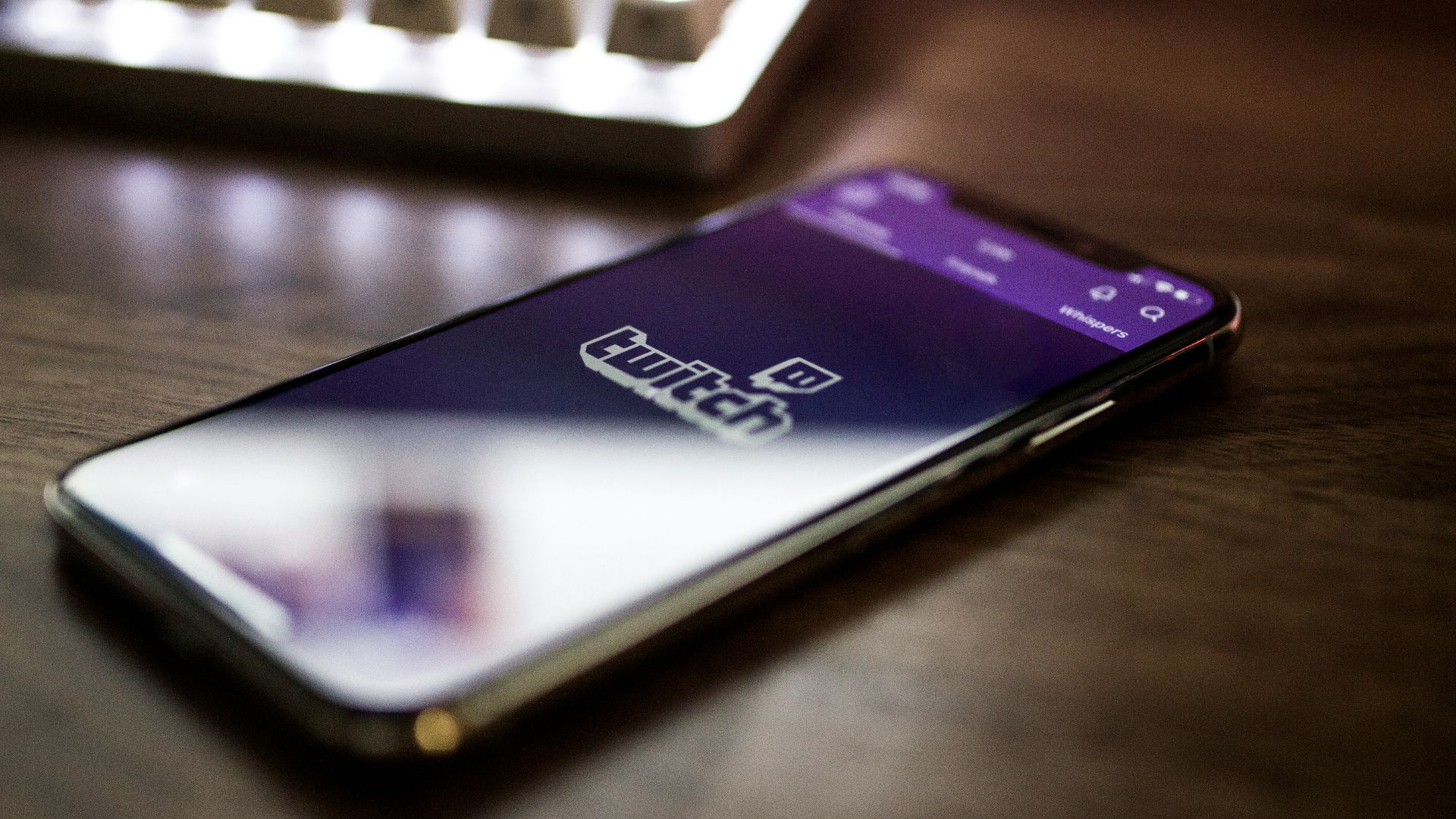 space gray iPhone X smartphone turned on