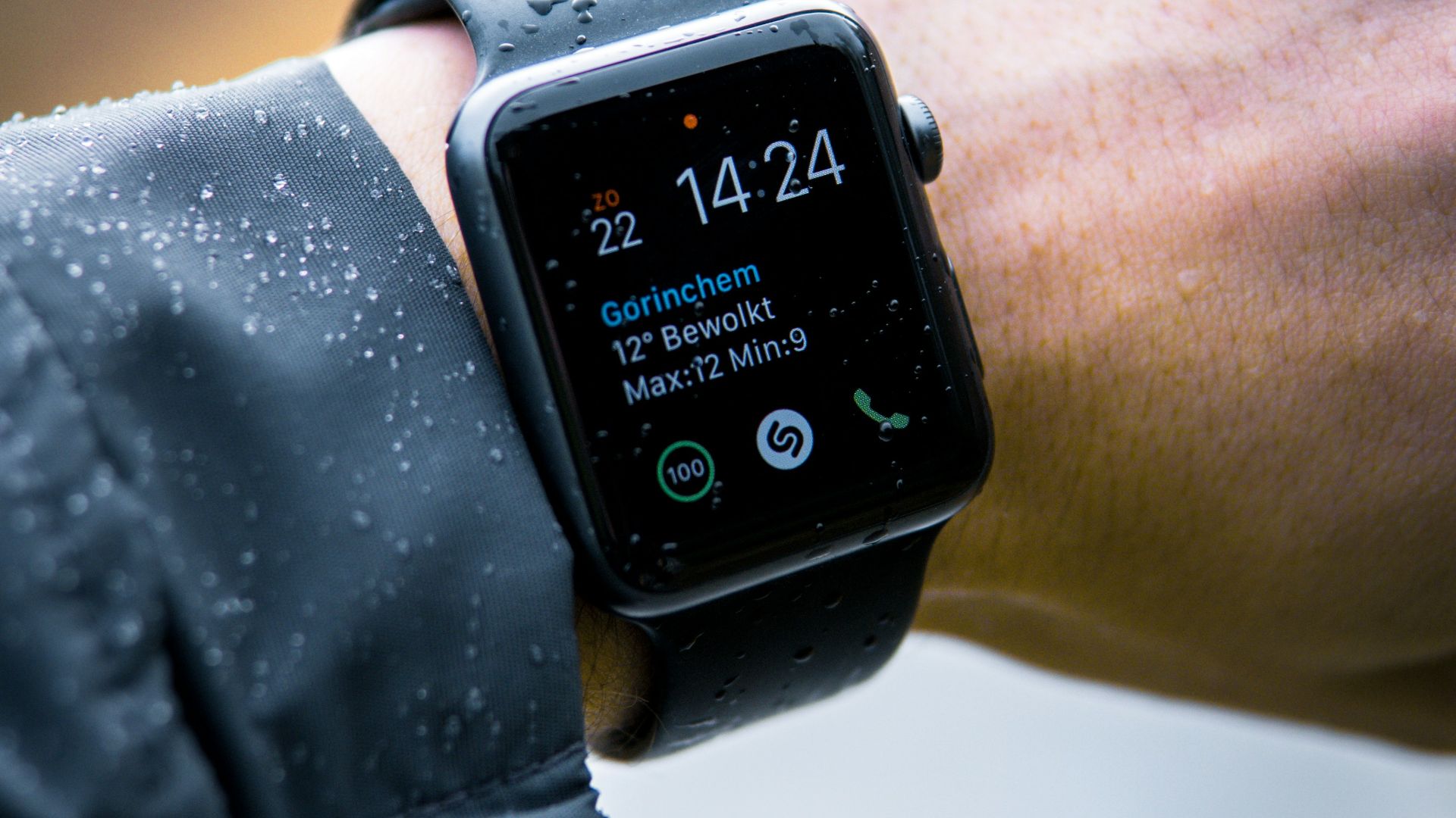 person wearing Apple Watch at 14:24