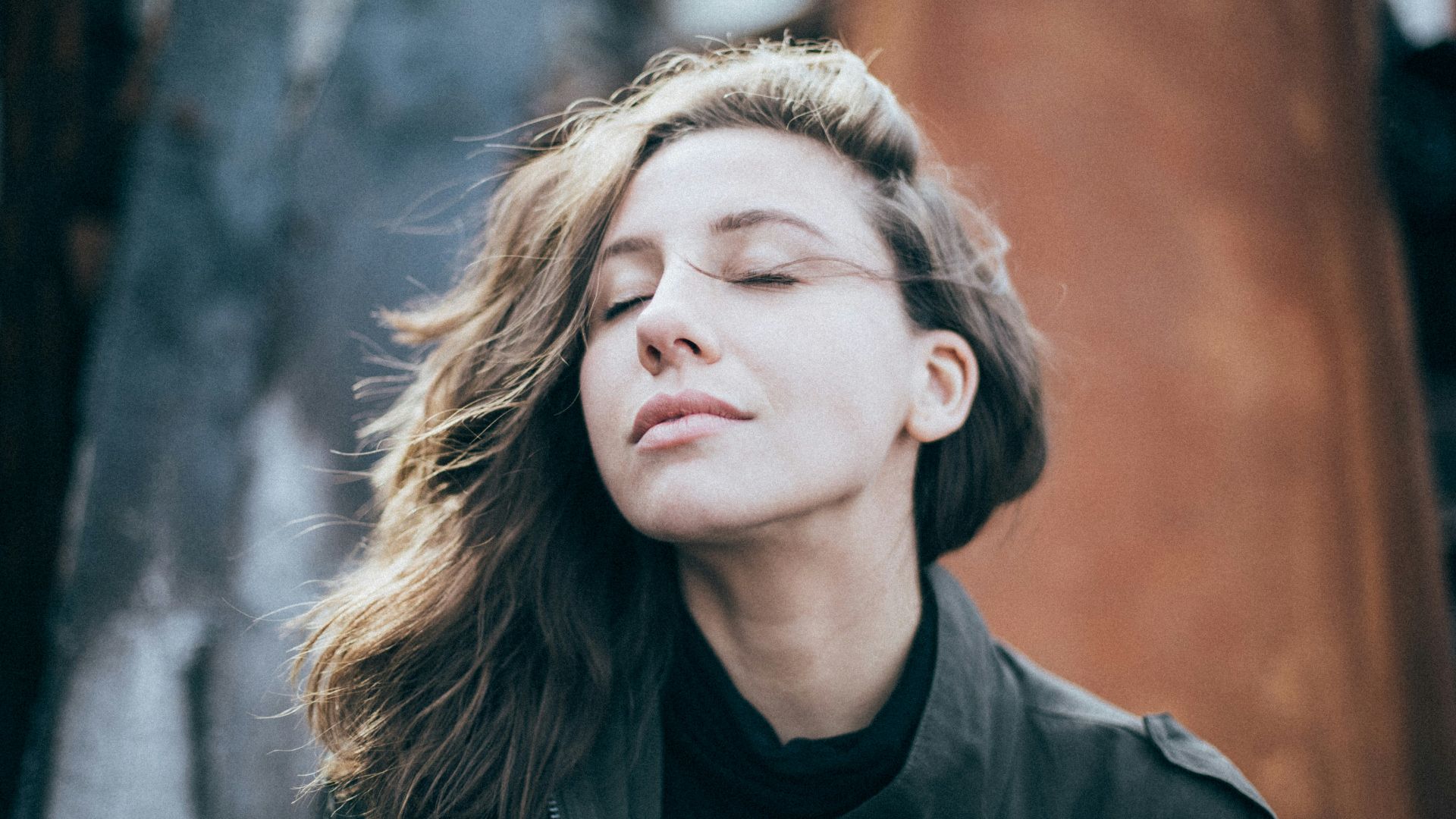 closeup photo of woman wearing black top