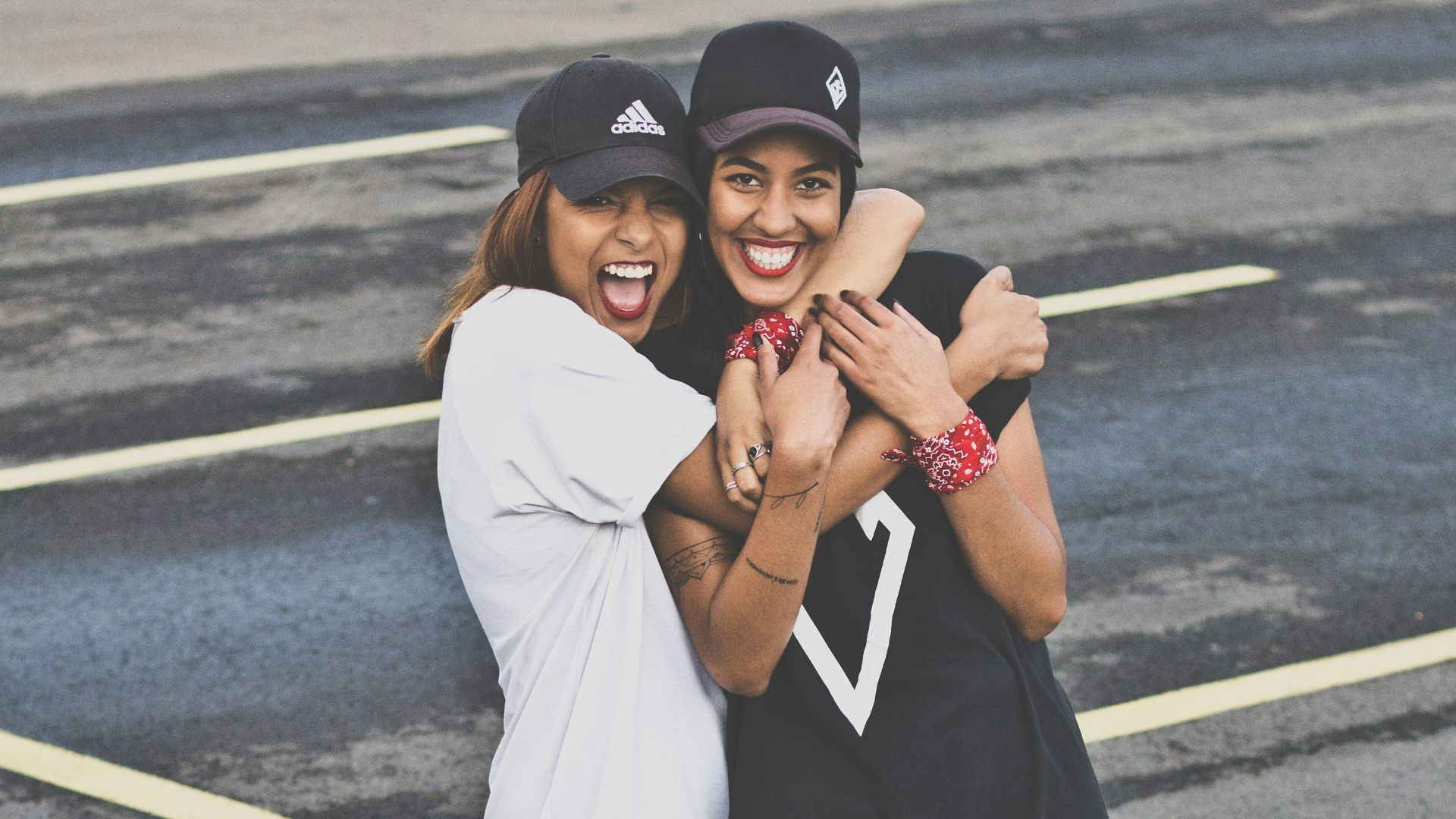 woman hugged another woman