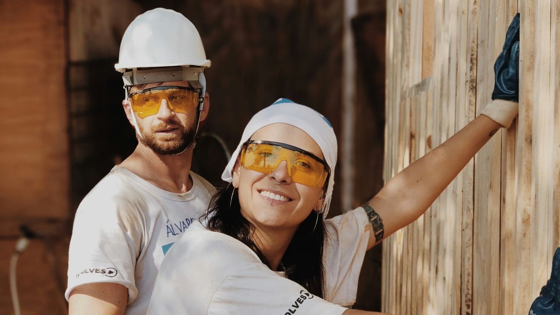 woman in white shirt wearing white helmet