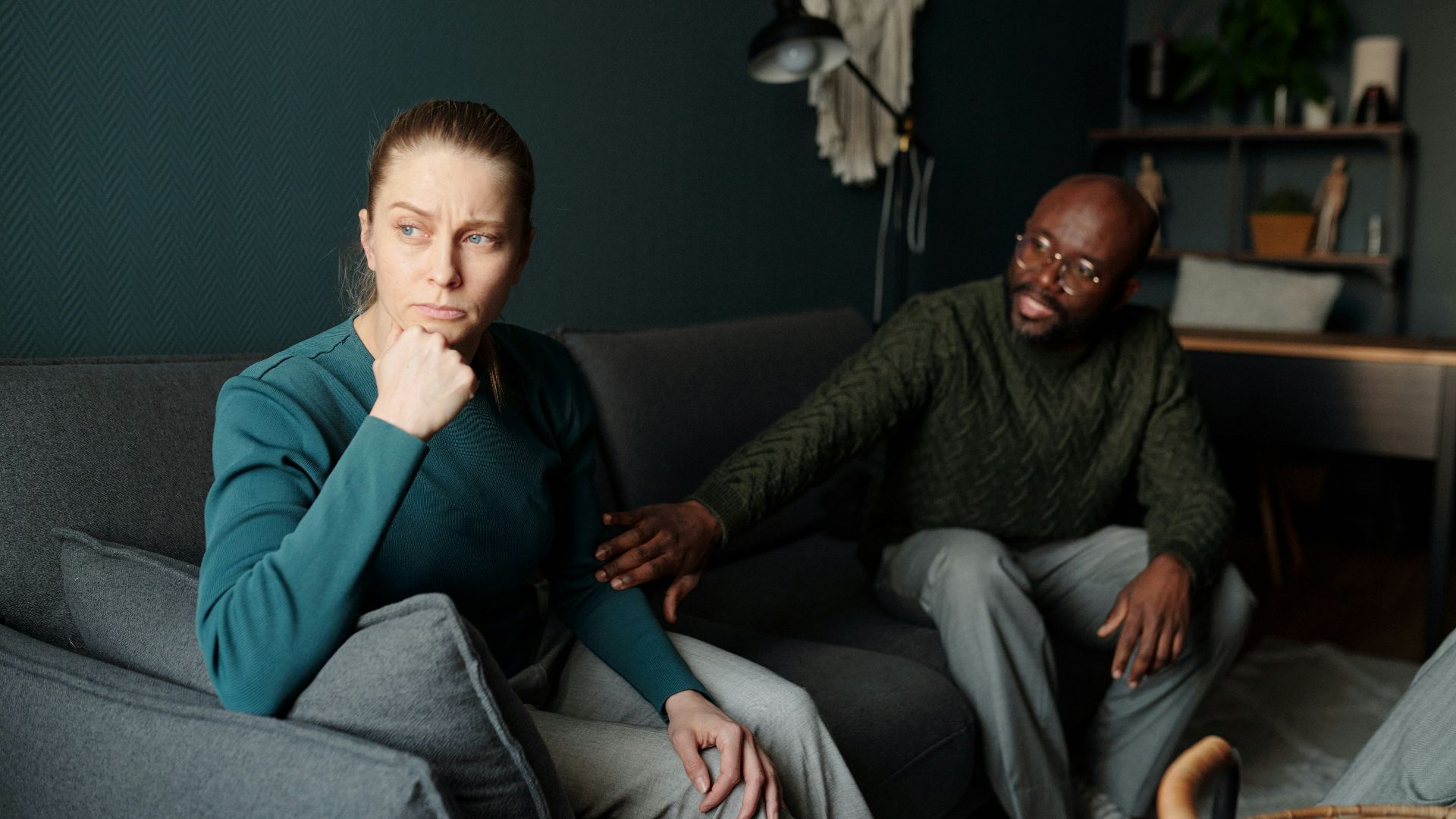 A couple appears to be having a serious conversation.