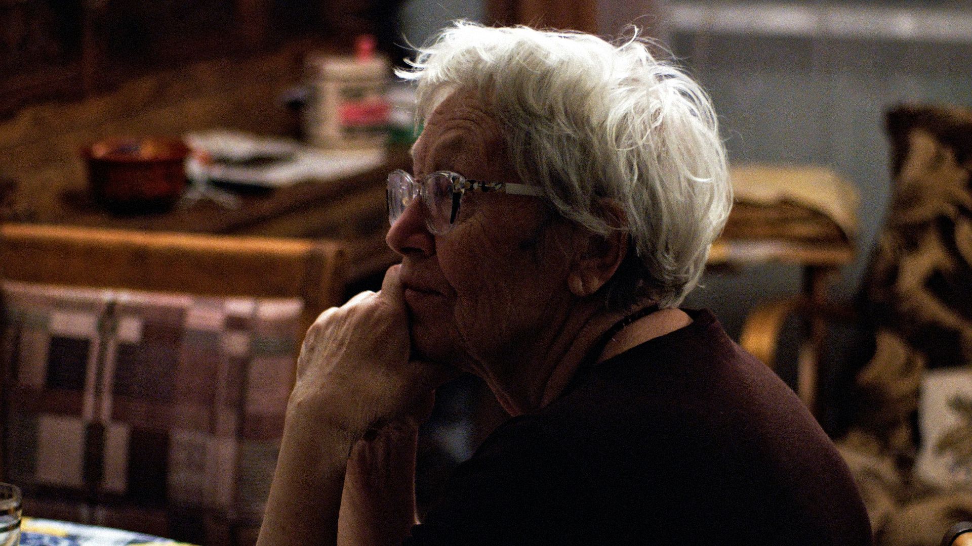 woman in black shirt wearing eyeglasses