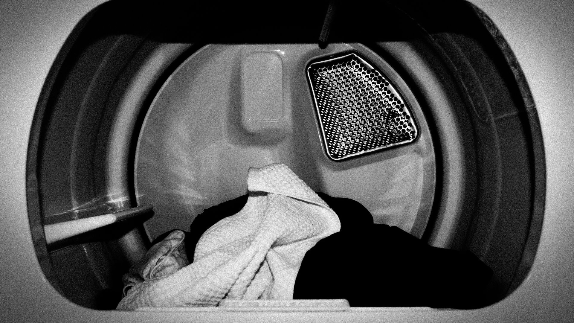 white front-load clothes washer