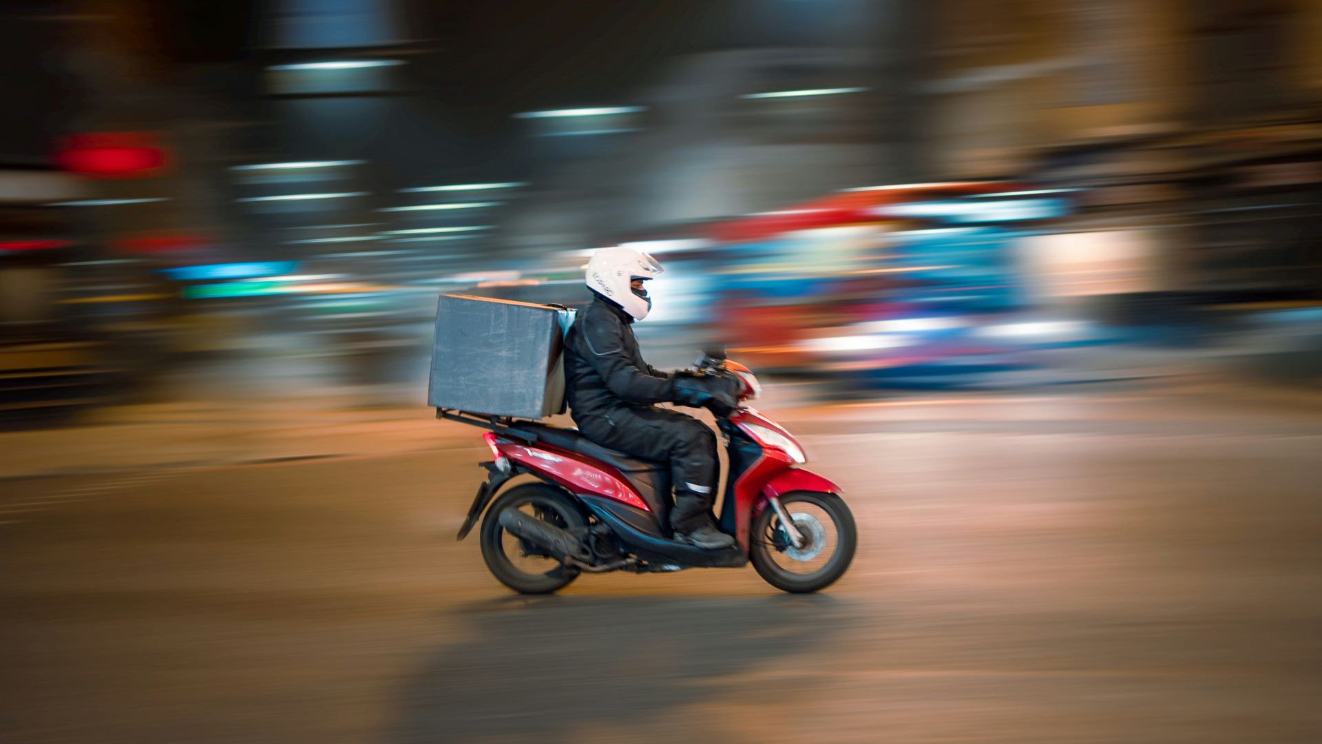 man riding motorcycle on road during daytime