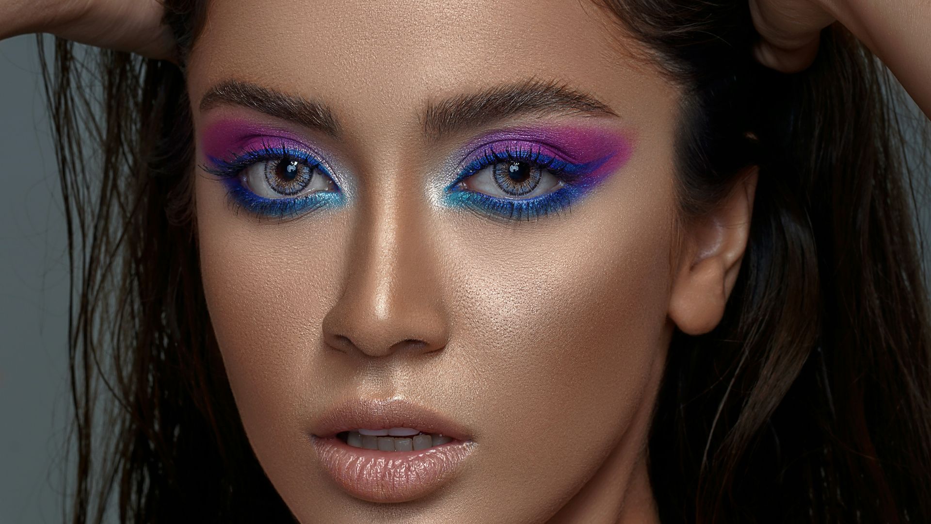 woman with blue eyes and black hair