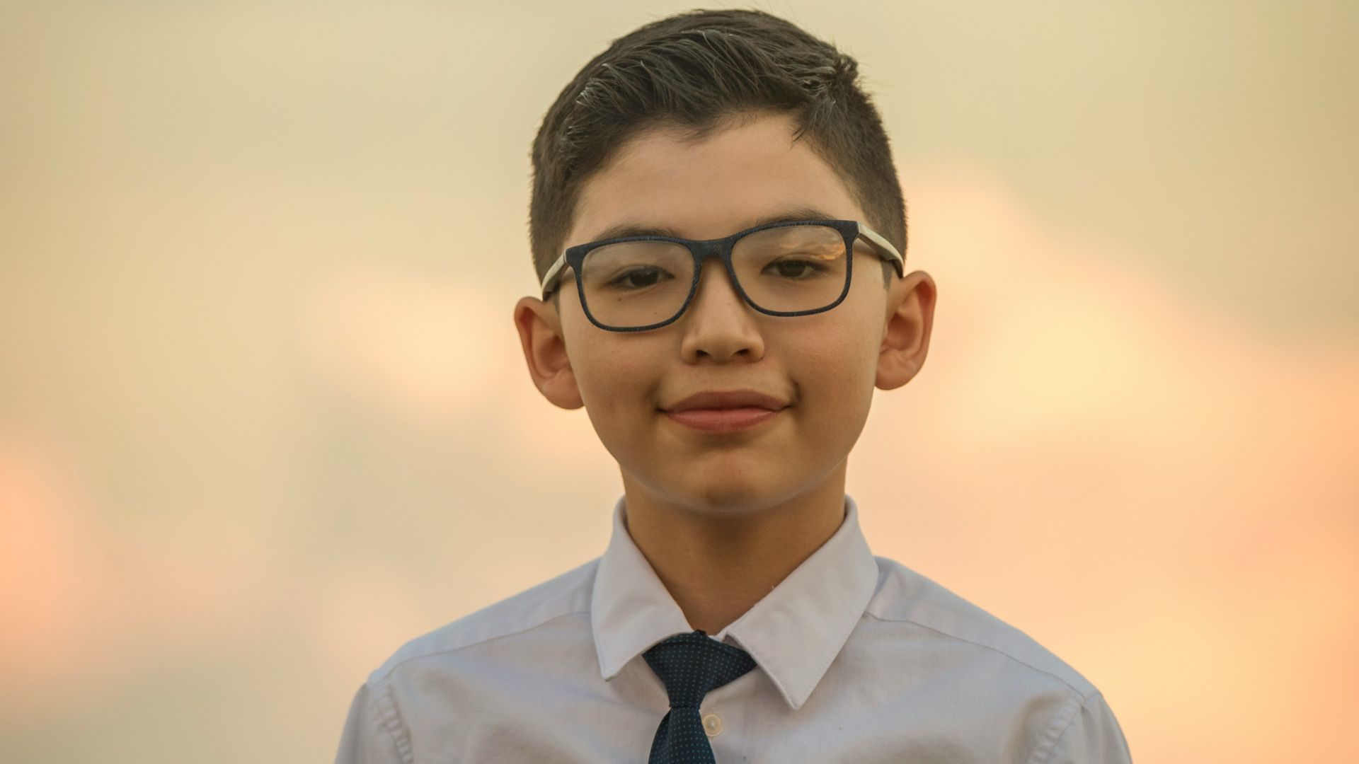 man in white dress shirt wearing black framed eyeglasses