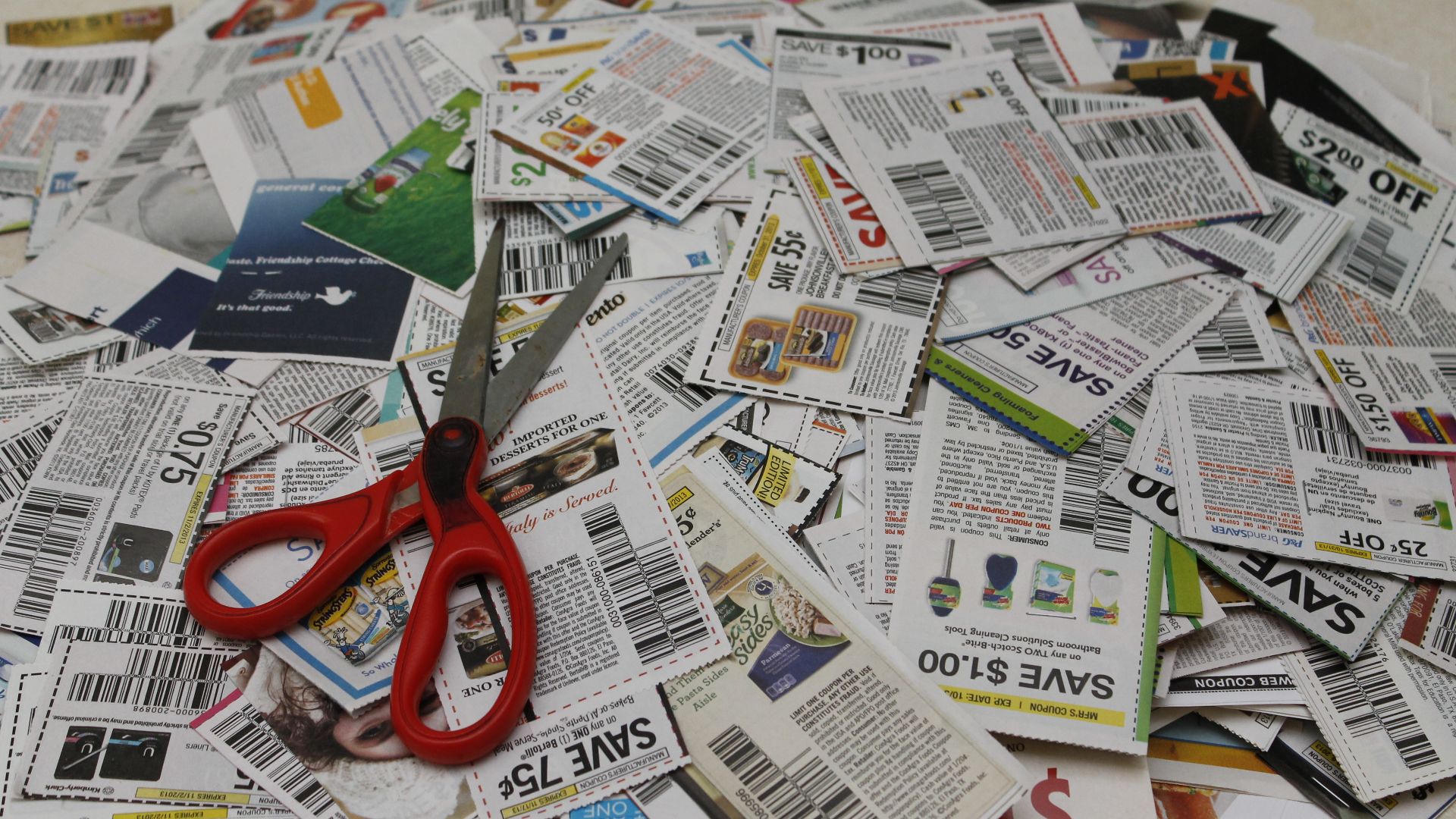 File:Coupon Pile Stock Photo (10865703765).jpg