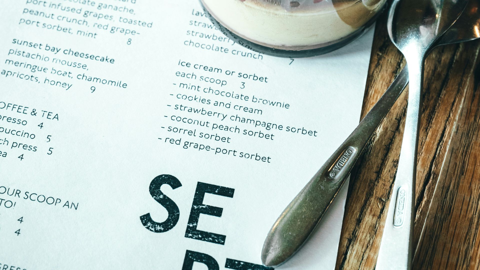 glass of dessert on table
