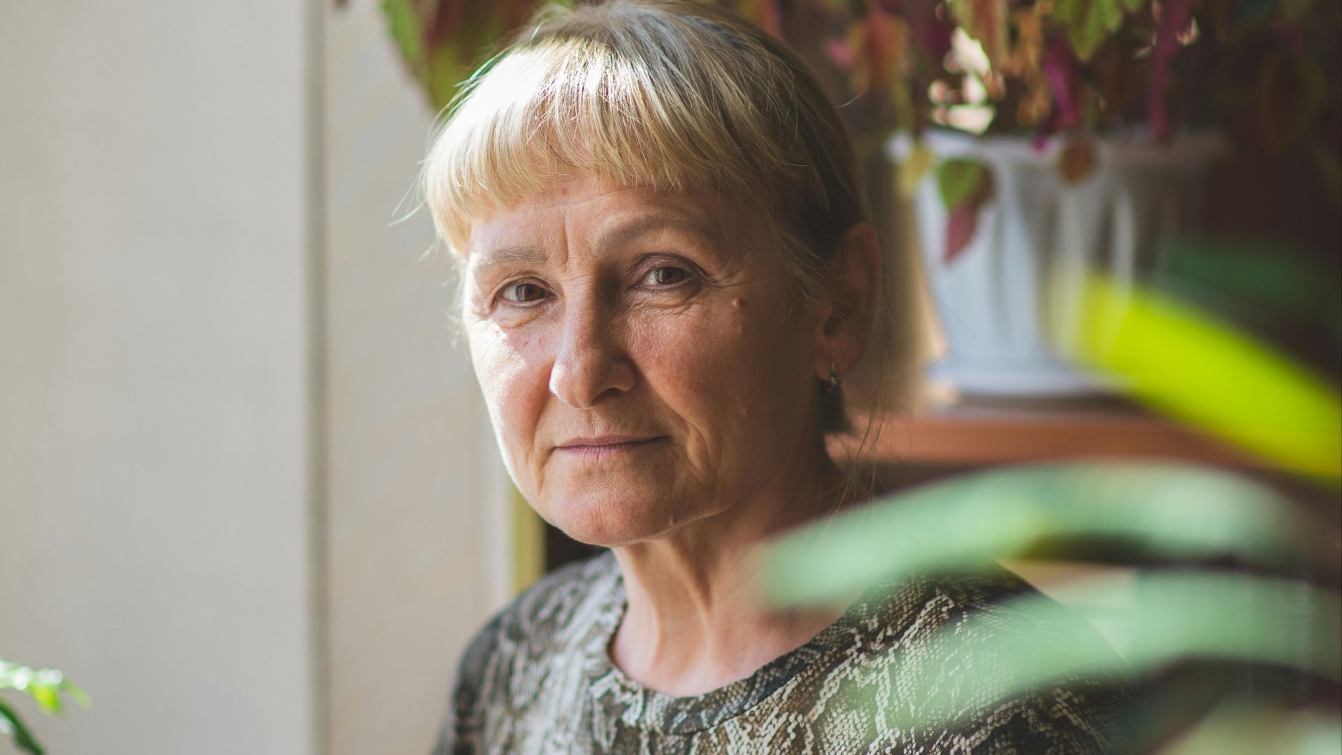 woman in gray and white crew neck shirt