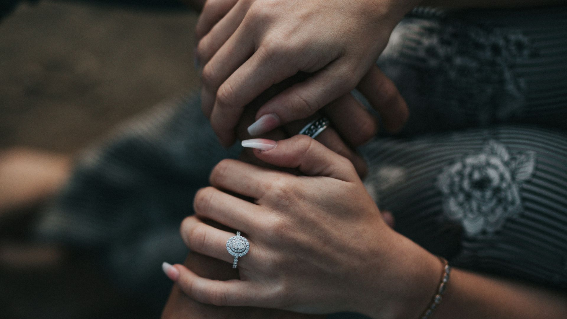 man and woman holding each others hands