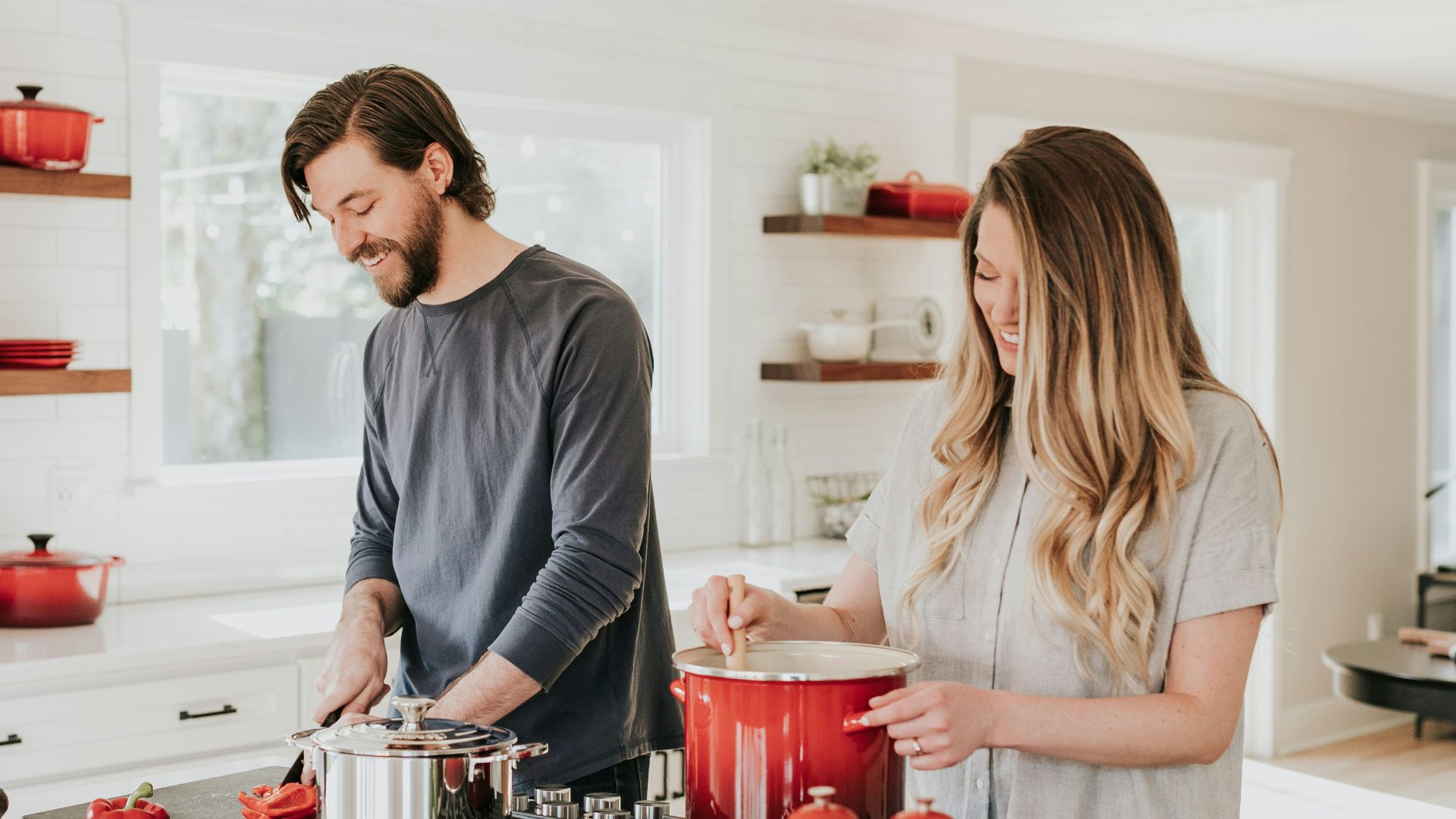man and woman on kitchen