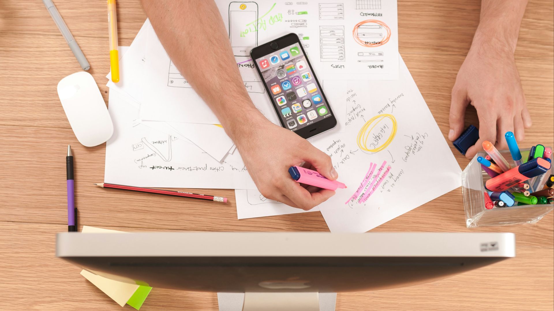 person writing on white paper