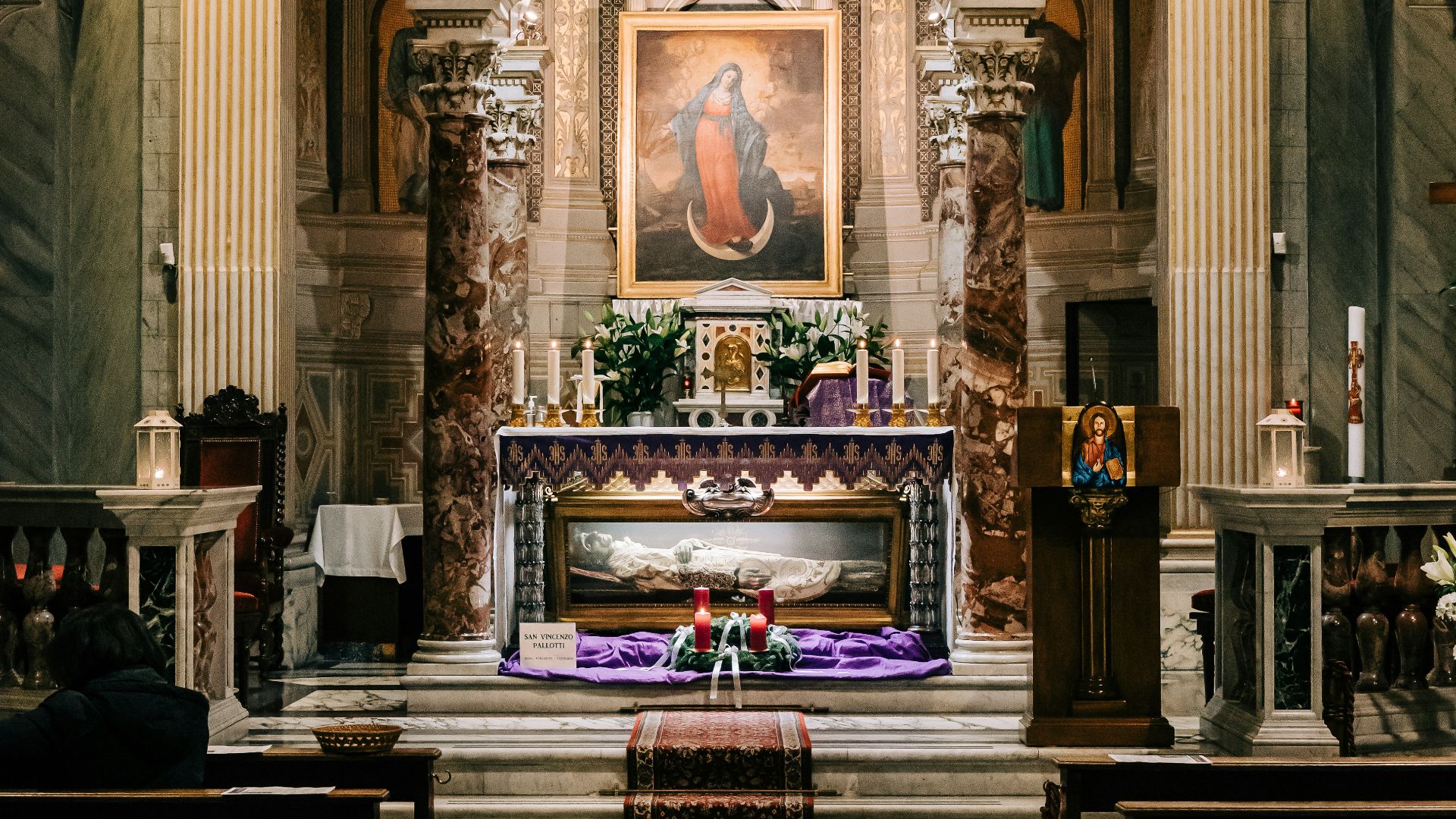 brown wooden table in church