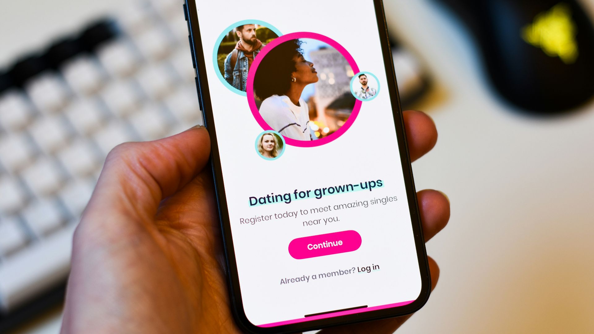 a person holding a cell phone in their hand