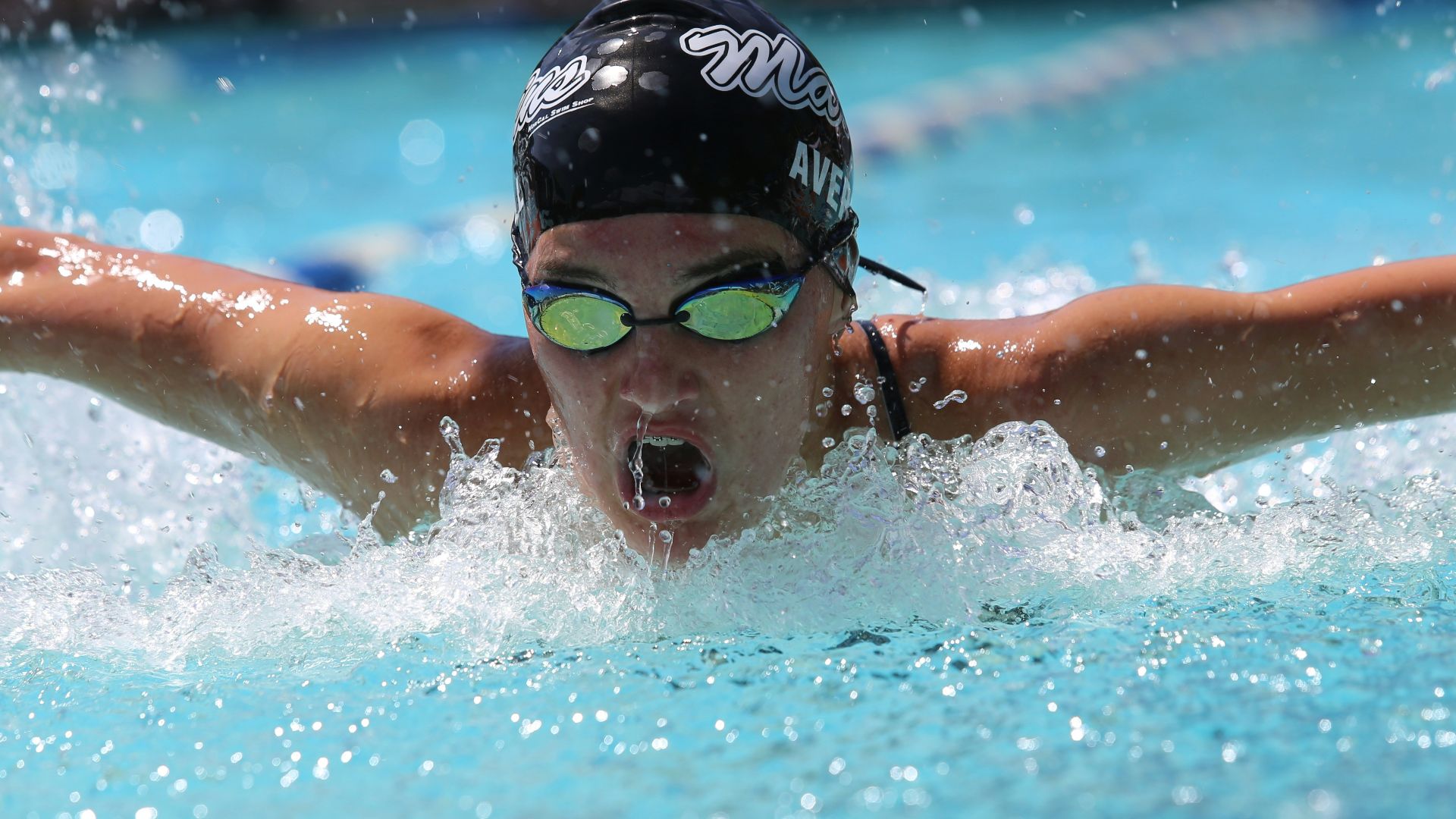 person in swimming goggles in swimming pool