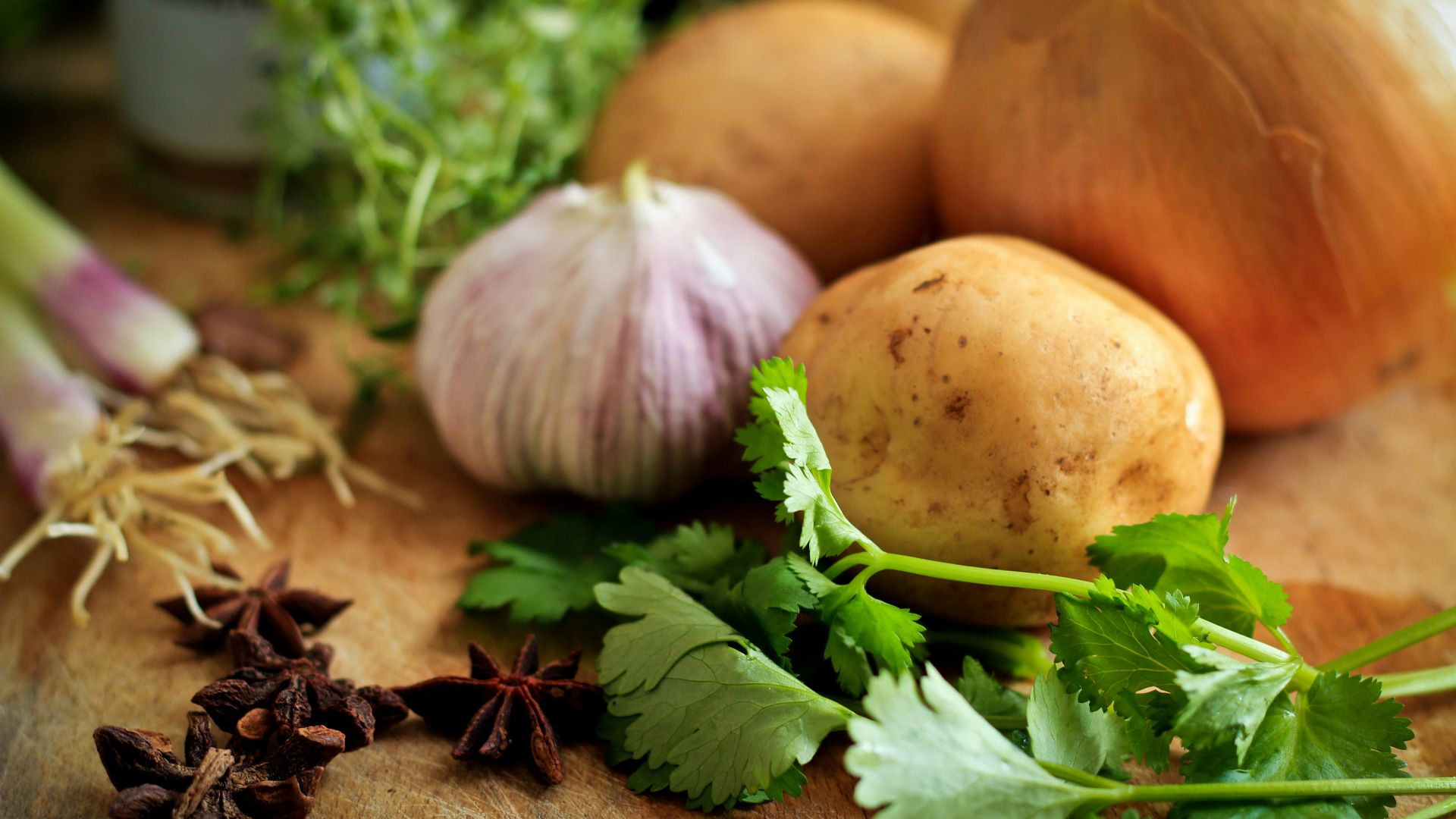 onions and potato on table