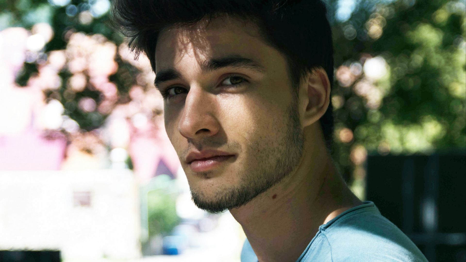 man standing near to tree