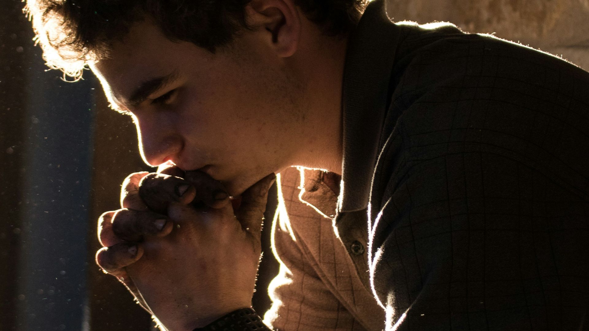 man sitting on bench