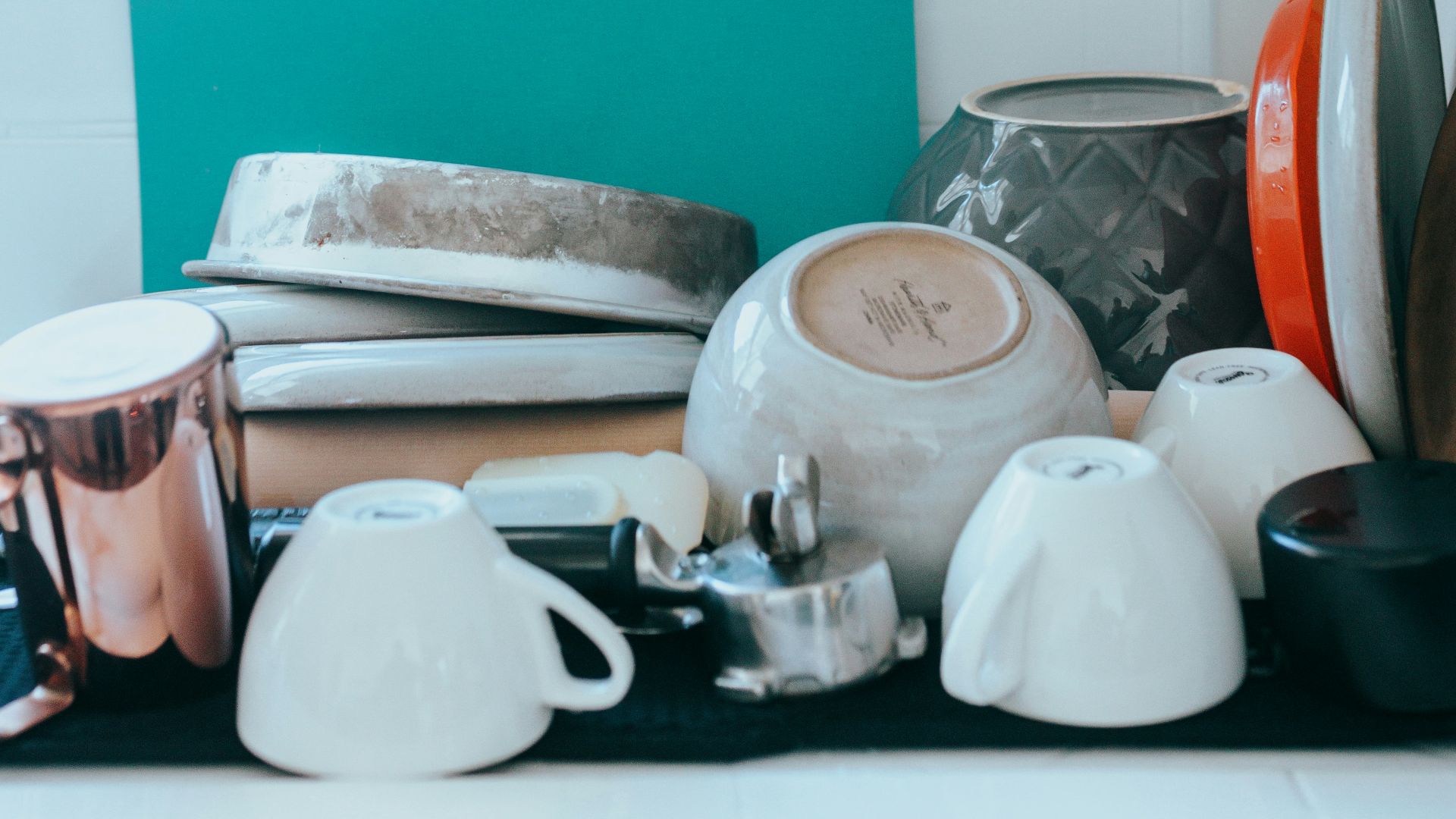 white wooden kitchen cabinet over white ceramic plate
