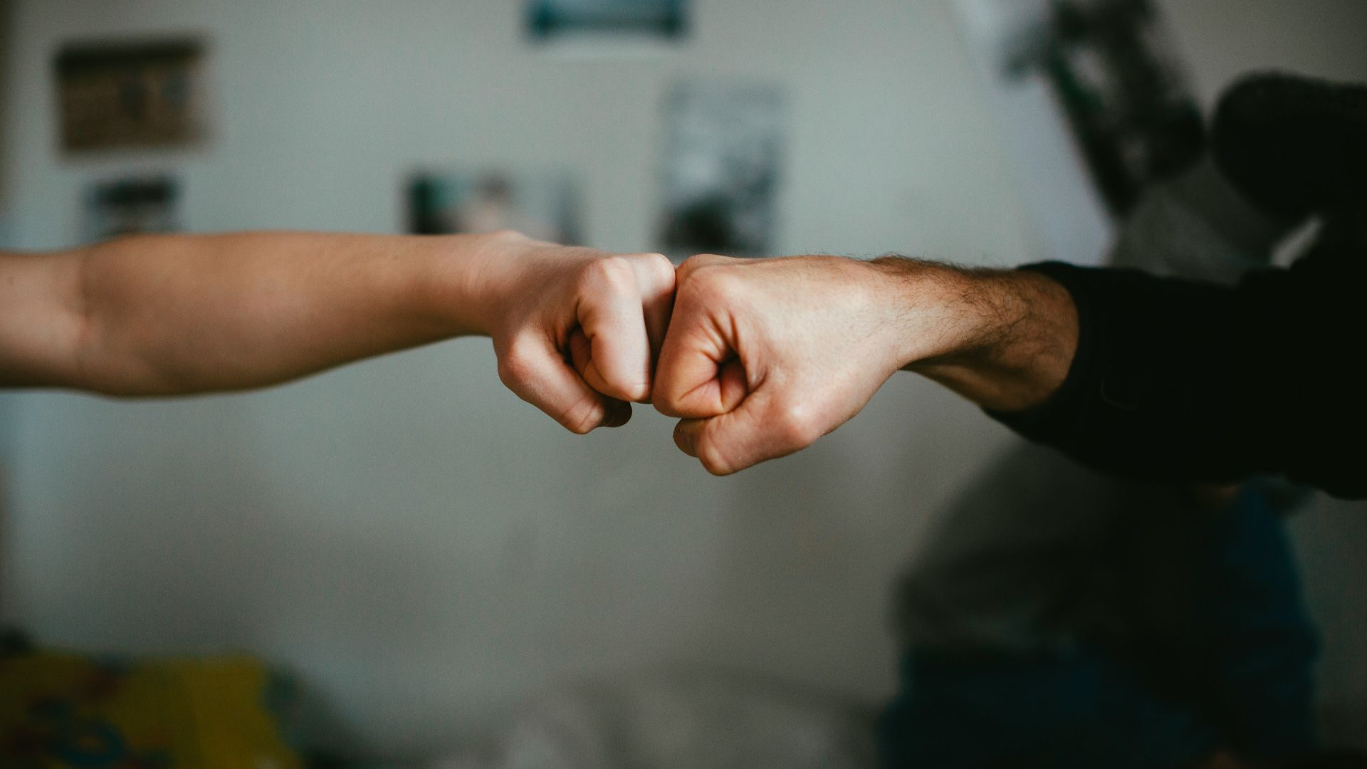 person holding babys hand