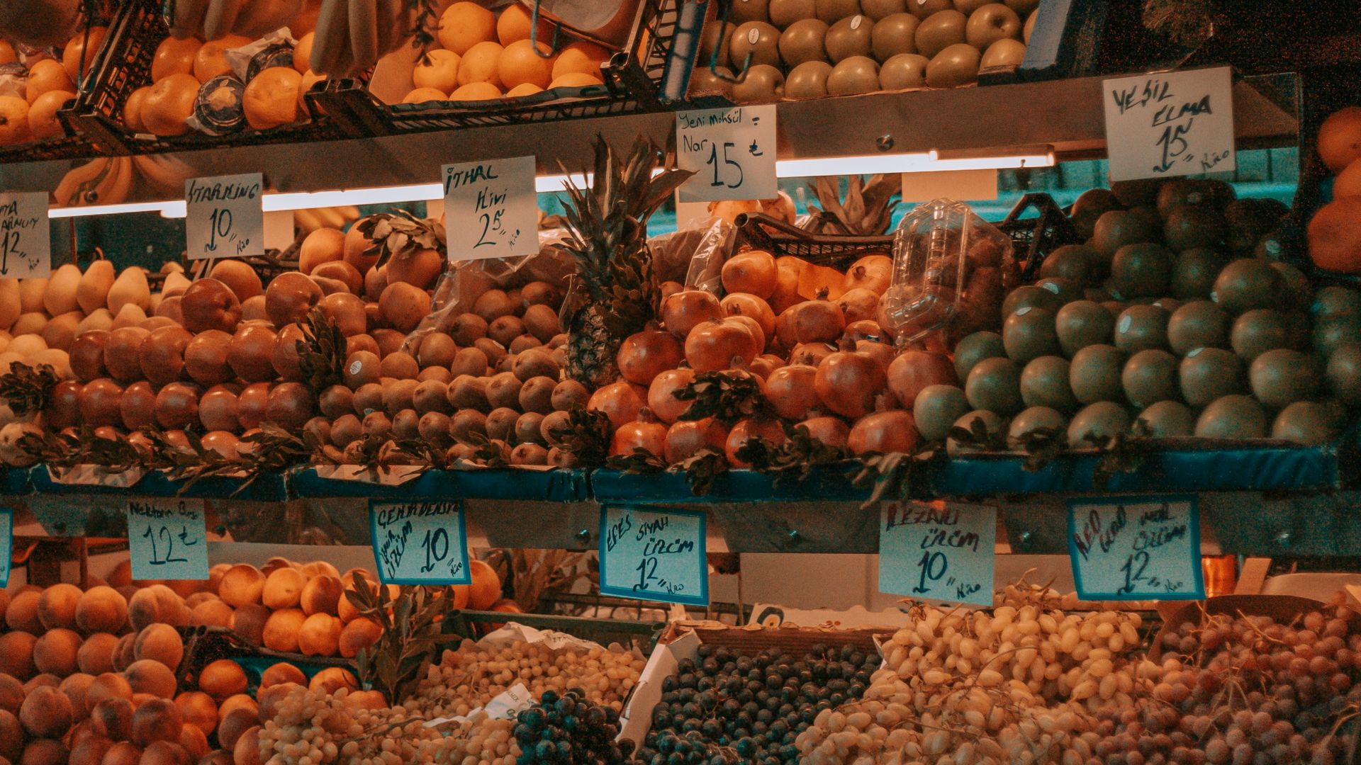 orange and banana fruit on fruit stand