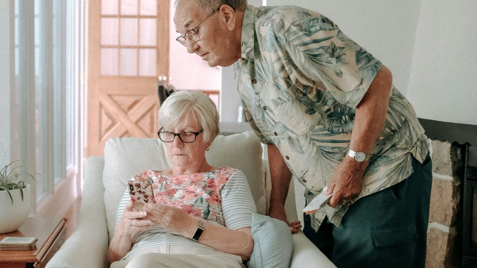 a woman and a man in a living room