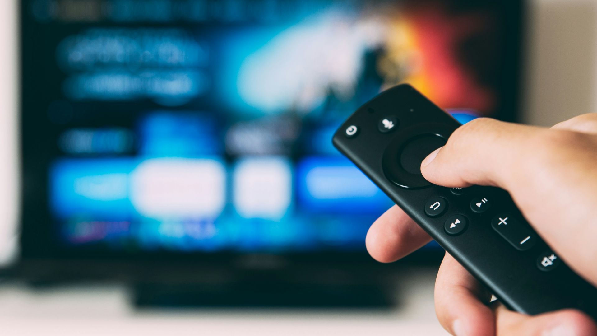 turned-on flat screen television