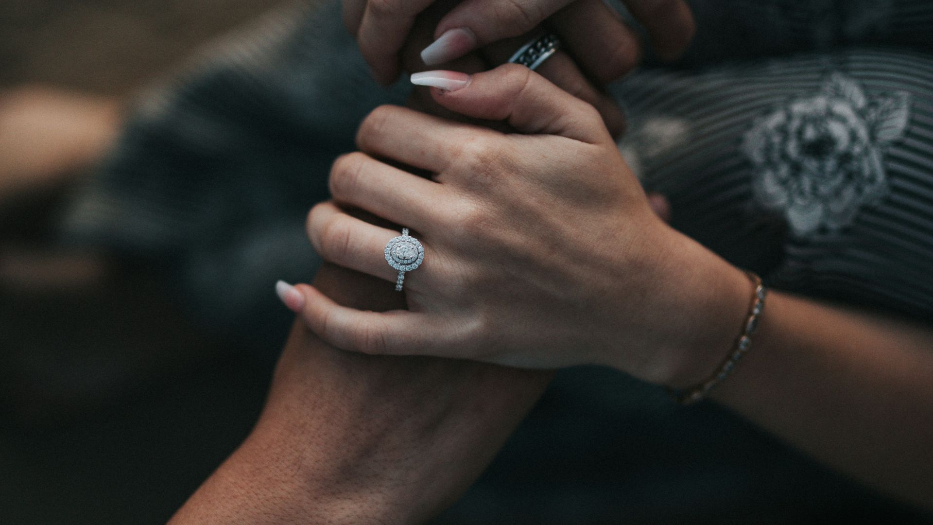 man and woman holding each others hands