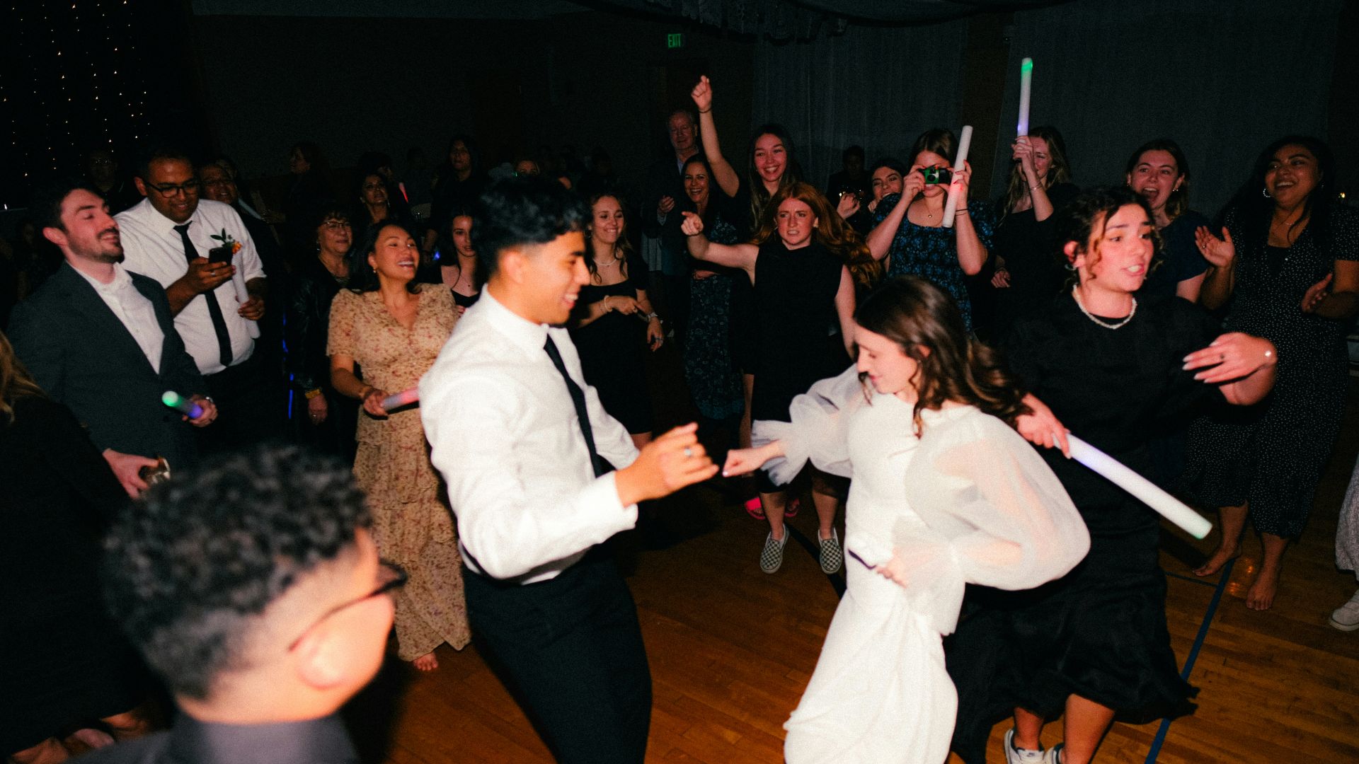 a couple of people that are on a dance floor