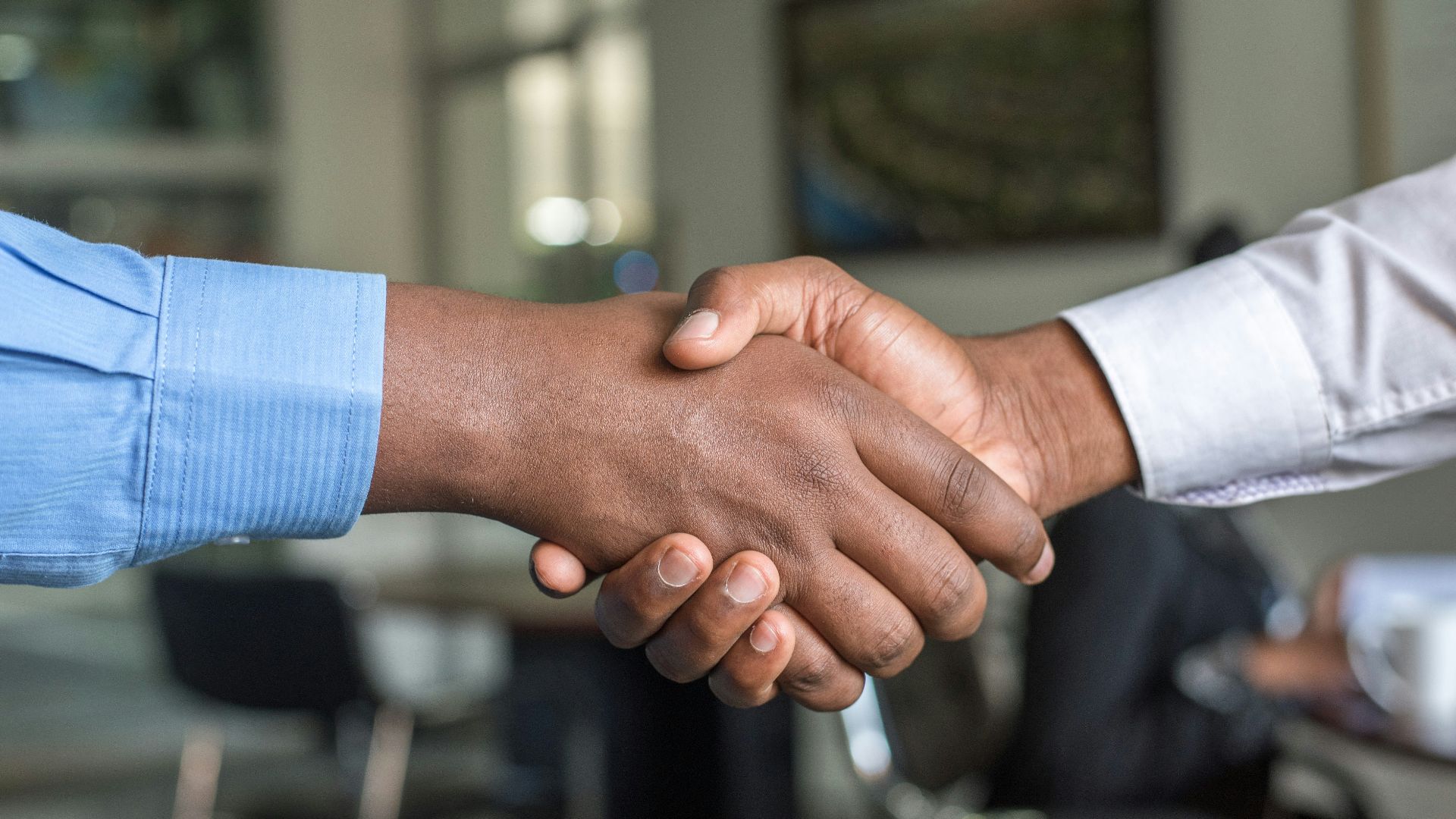 two people shaking hands