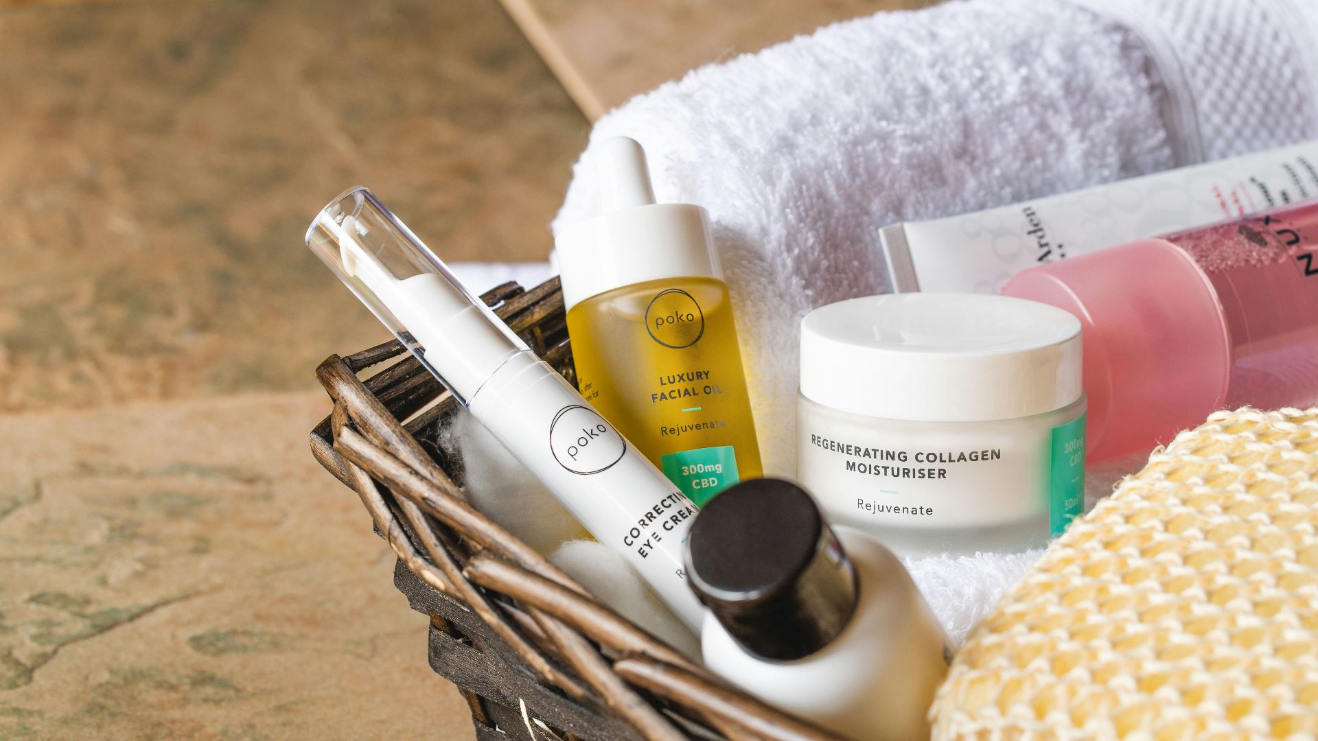 white and gold plastic bottles on brown wooden table