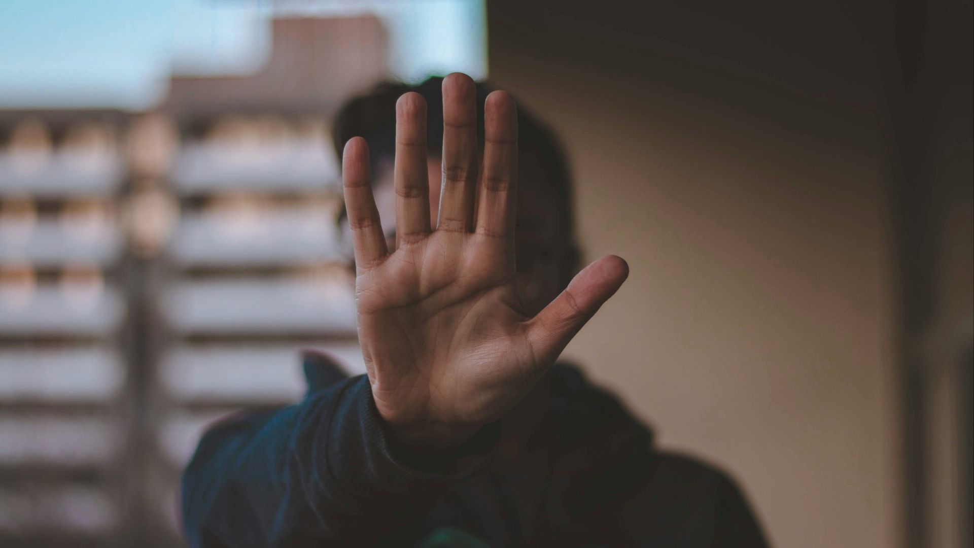 man standing while wearing black jacket