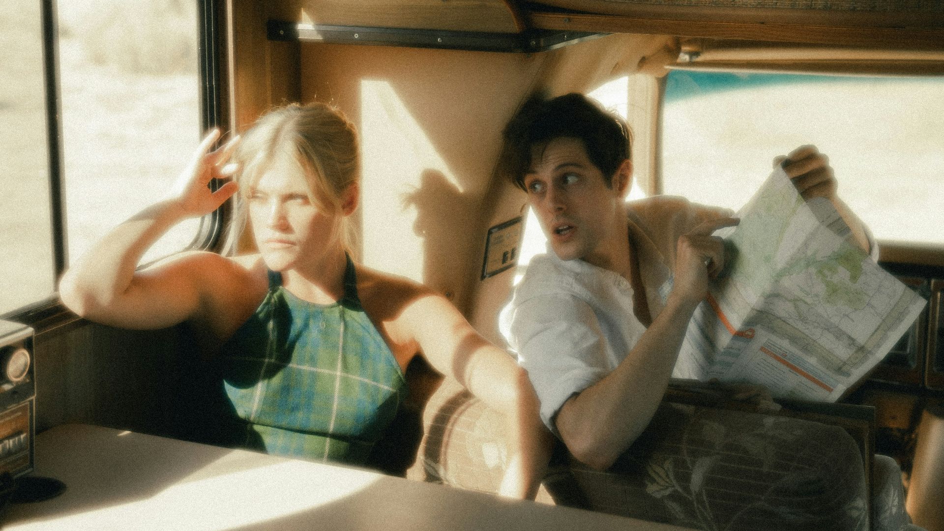 woman in green long sleeve shirt sitting on chair