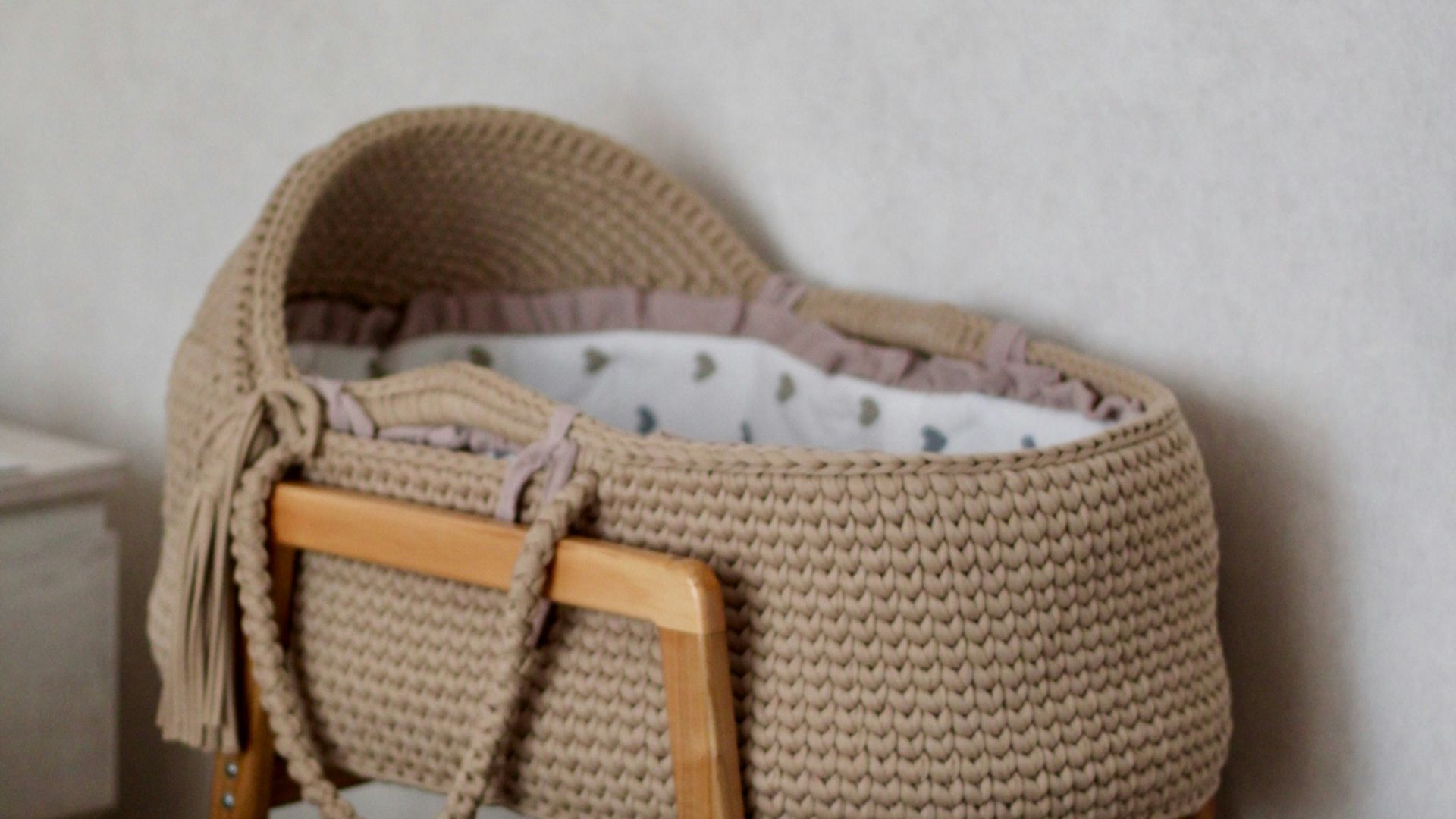 A bed with a basket on top of it