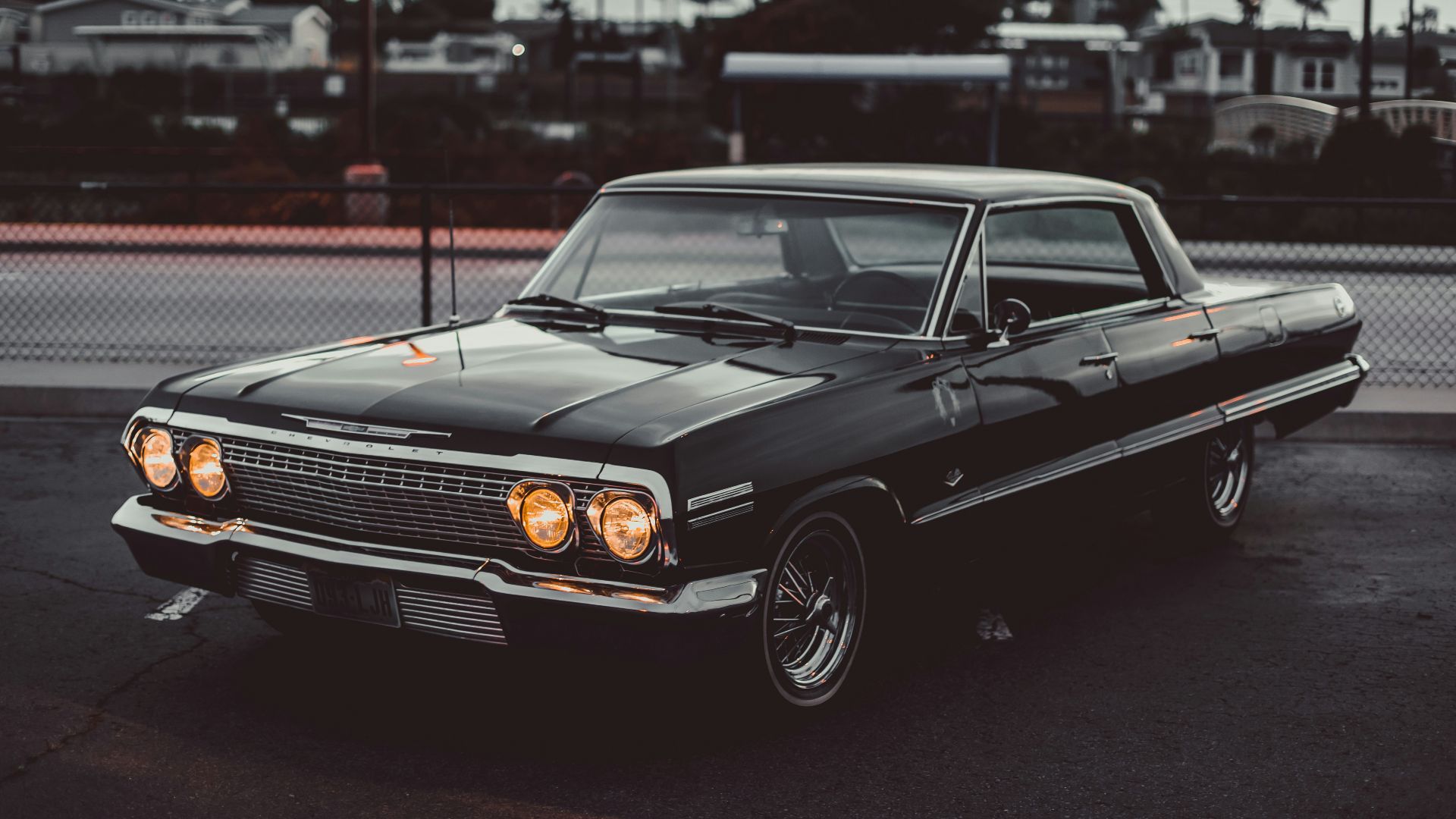 black chevrolet camaro on road during daytime