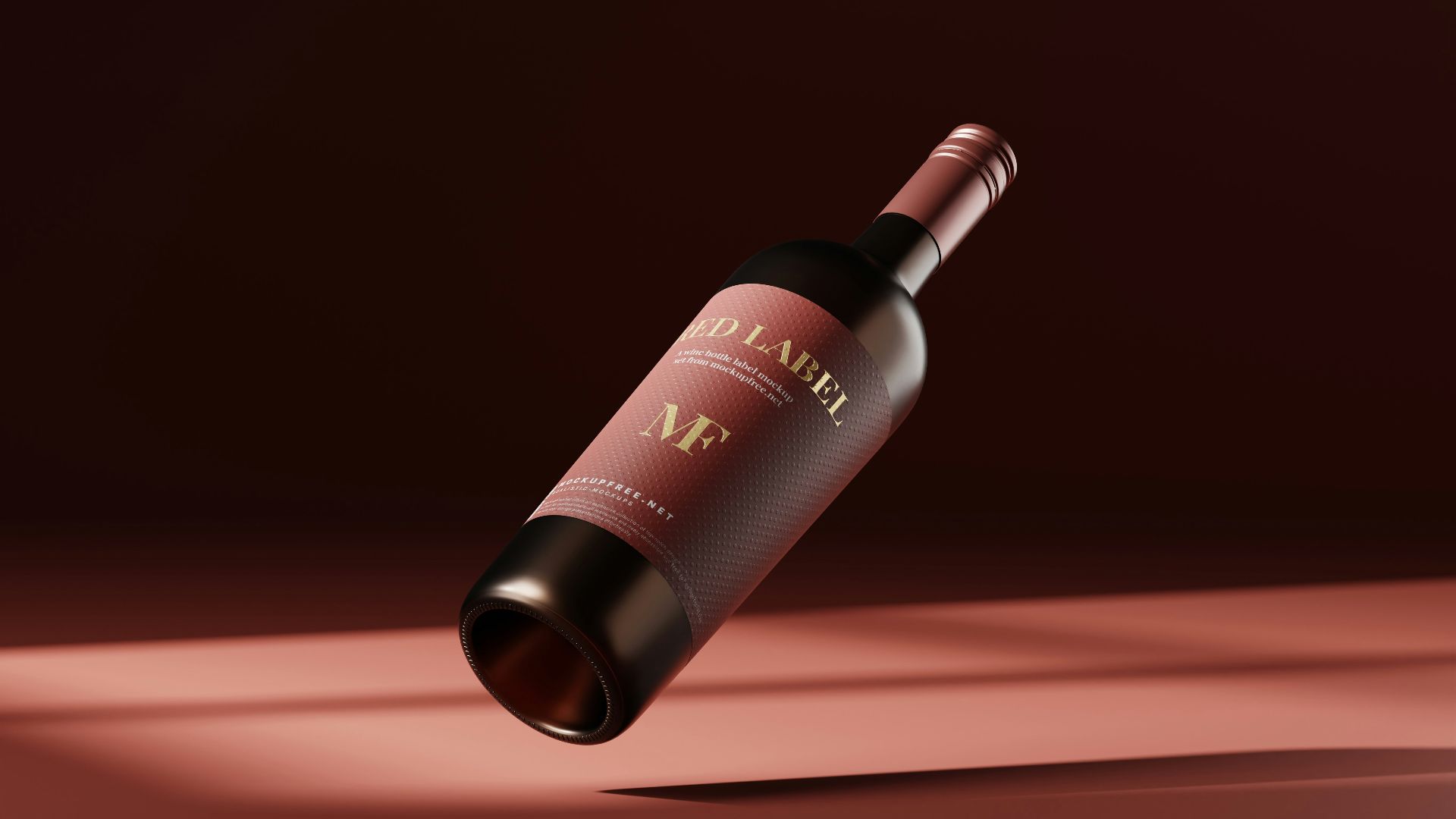 a bottle of wine on a red surface