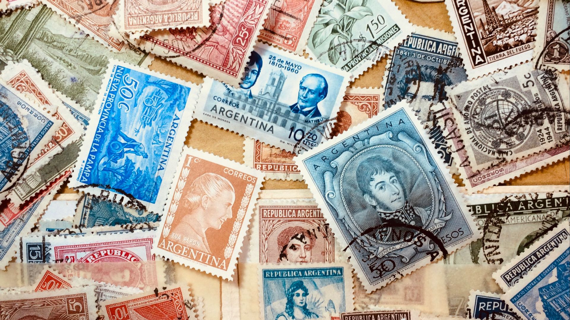 assorted coins on brown wooden table
