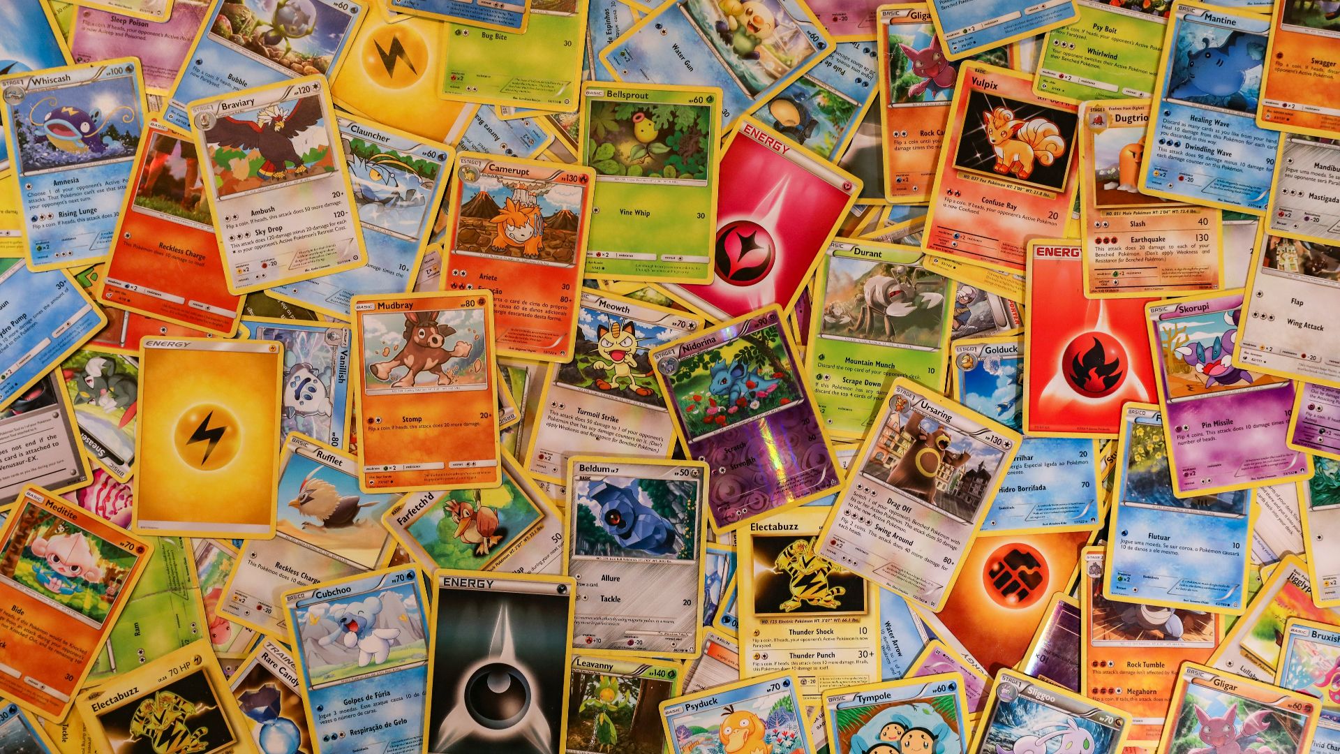 red ceramic mug on brown wooden table