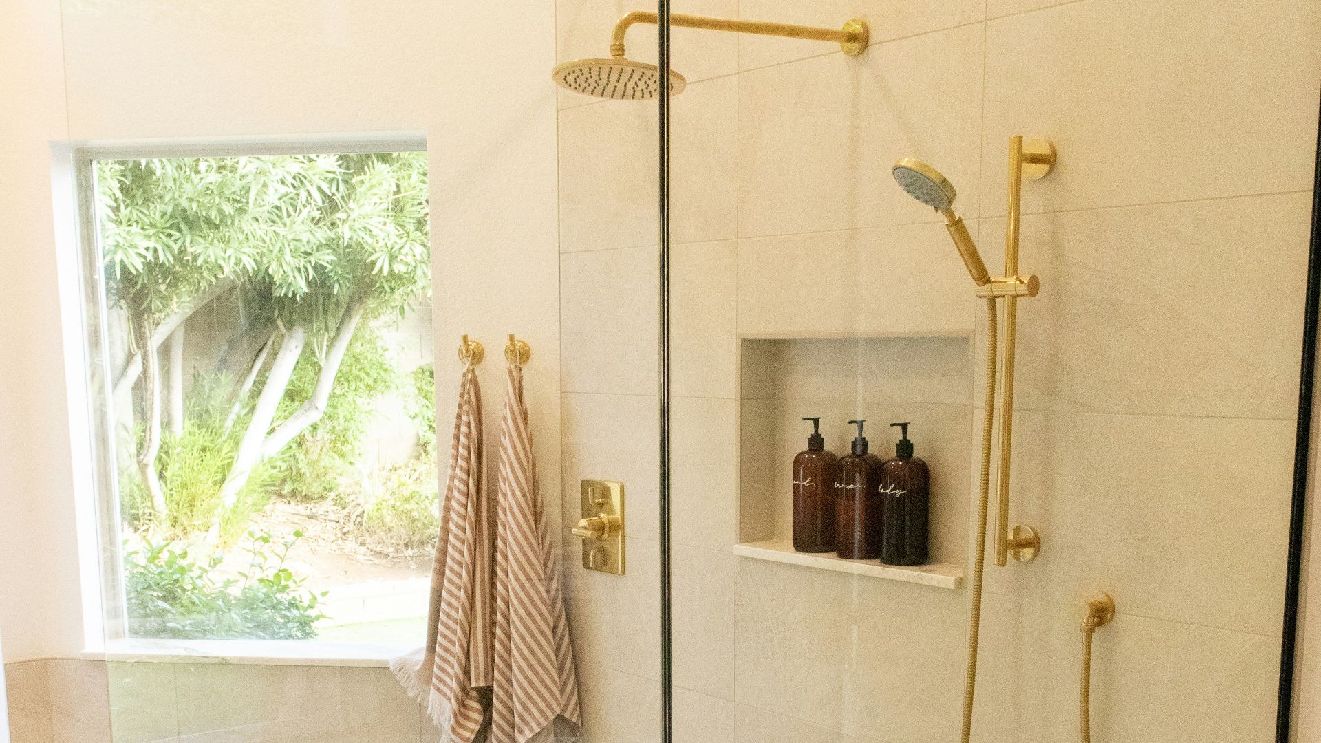 white bathtub with shower curtain